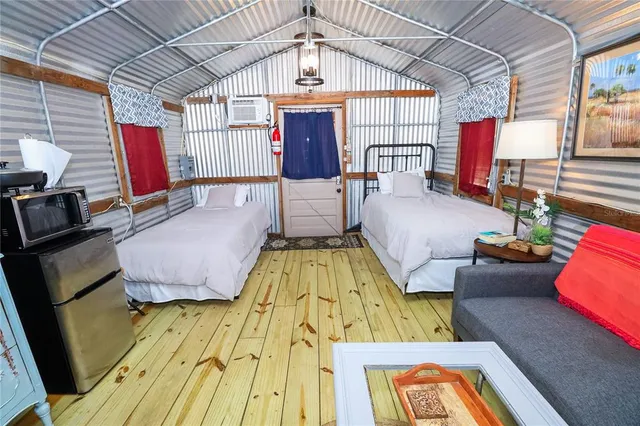 a bed room with a bed and a table