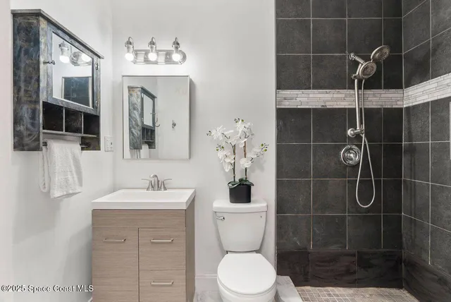a living room with furniture and rug
