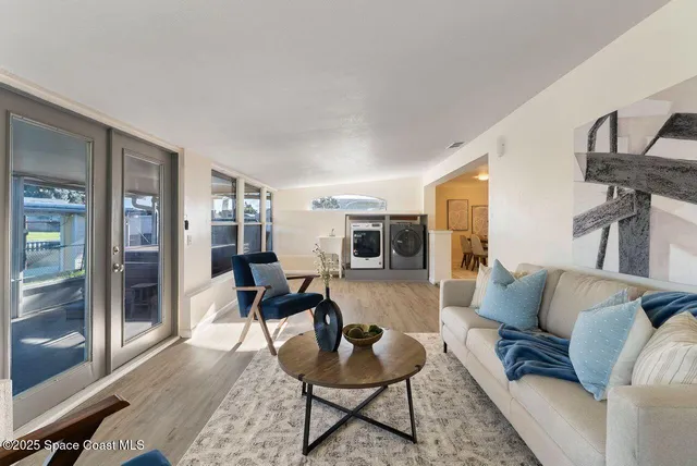 a bathroom with a sink mirror and toilet