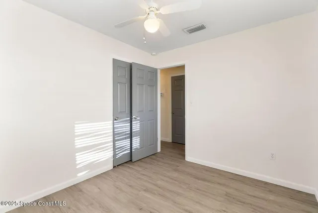 a view of a chairs and table in the patio