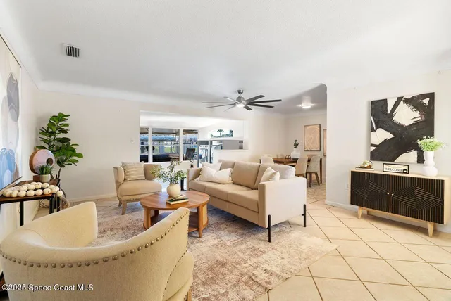 a kitchen with cabinets appliances and a window