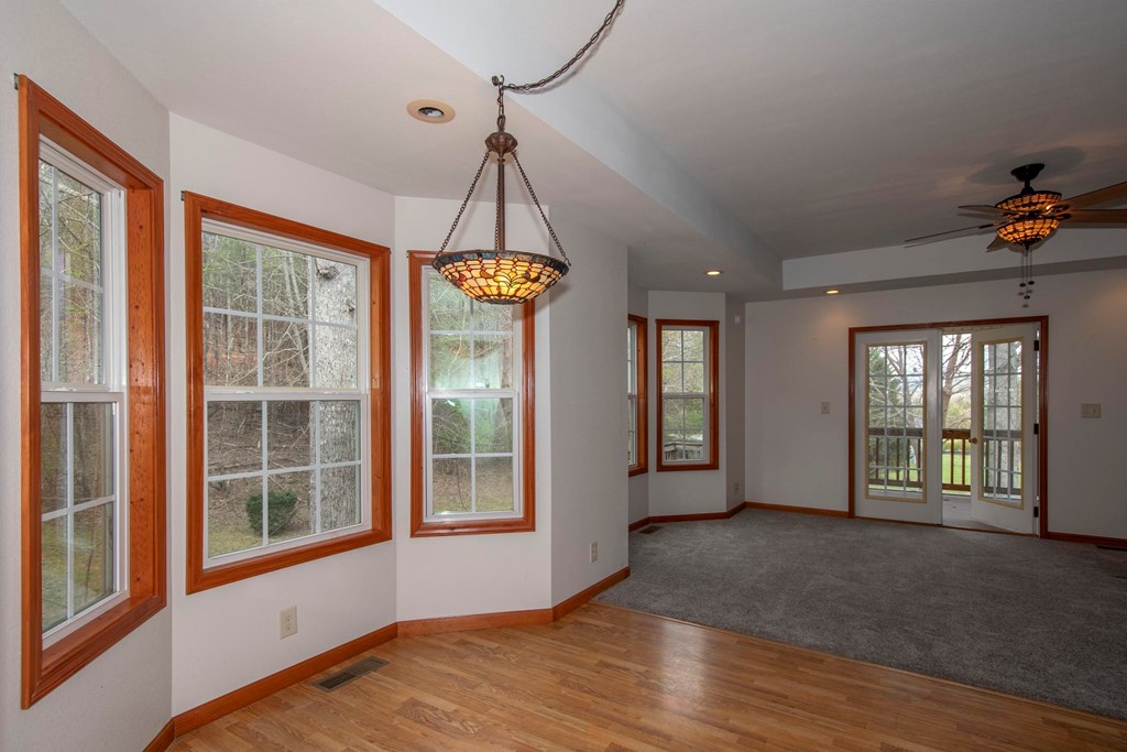 5224 Laurel Ridge Young Harris, GA 30582 - Photo 12 of 39 a view of an empty room with a window and wooden floor