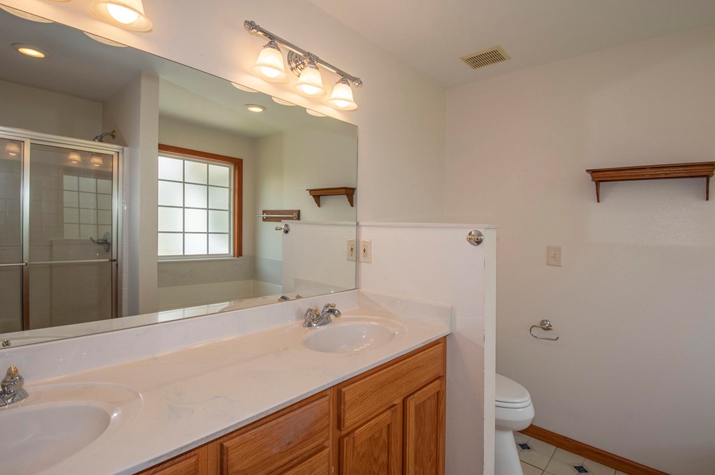 5224 Laurel Ridge Young Harris, GA 30582 - Photo 18 of 39 a bathroom with a sink and a large mirror