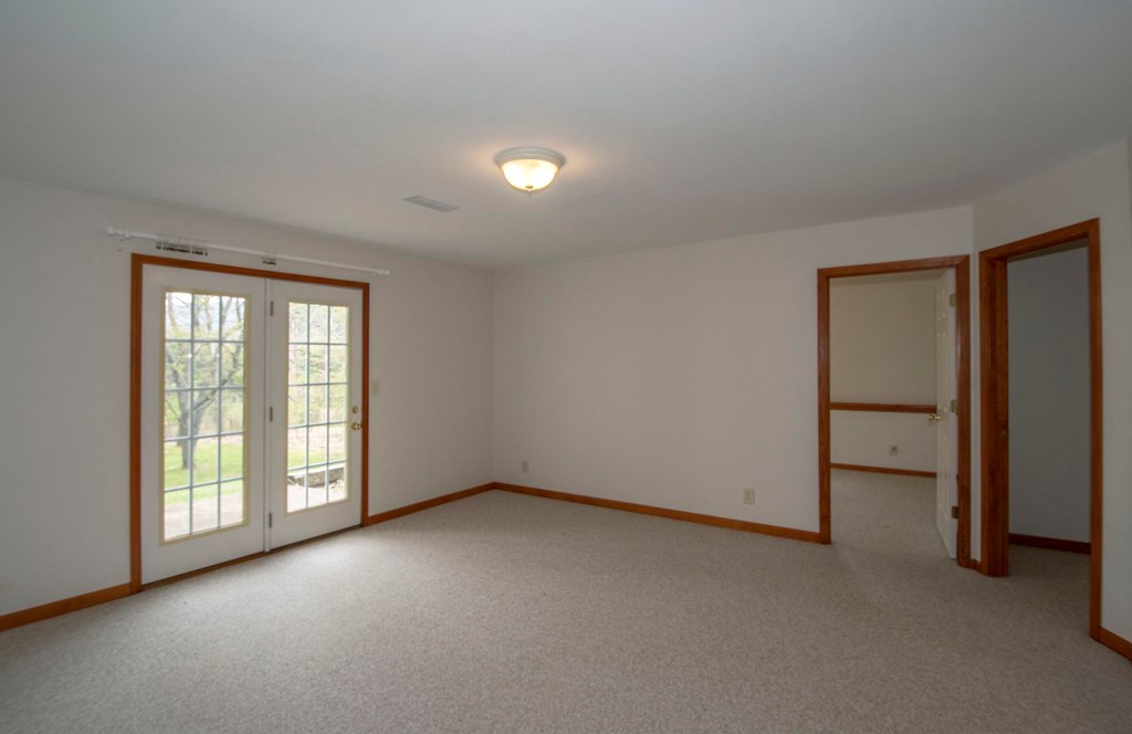 5224 Laurel Ridge Young Harris, GA 30582 - Photo 27 of 39 an empty room with windows and closet