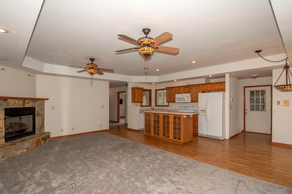 5224 Laurel Ridge Young Harris, GA 30582 - Photo 5 of 39 a view of livingroom with hardwood floor and a ceiling fan