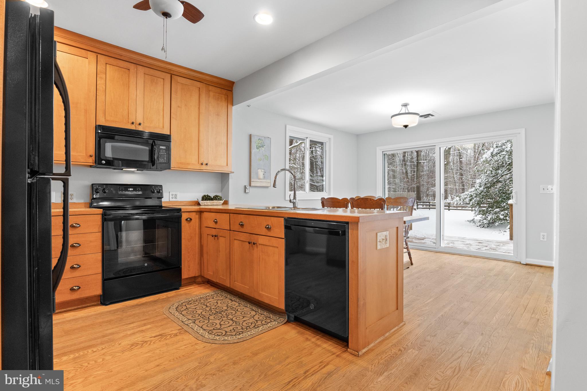 1709 Governor Bridge Road Davidsonville, MD 21035 - Photo 7 of 25 Kitchen opens to deck & backyard