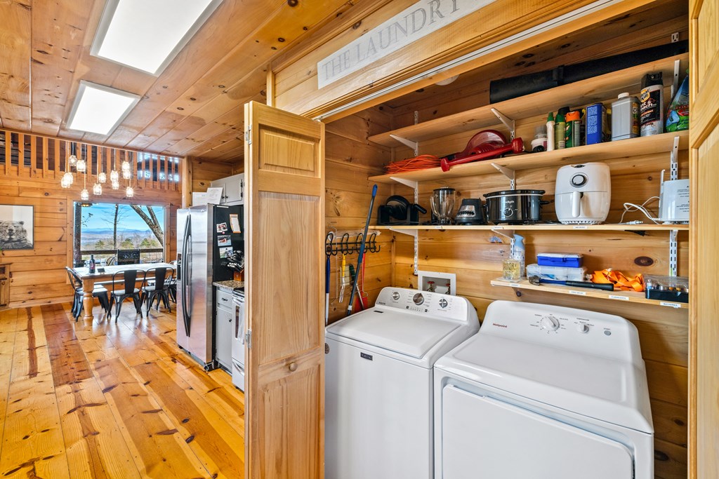 907 Ripshin Mountain Road Blue Ridge, GA 30513 - Photo 12 of 55 a utility room with dryer and washer