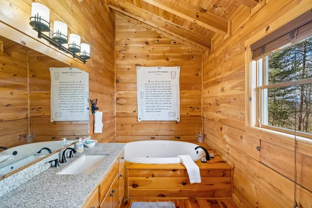 a view of a two chairs in the roof deck
