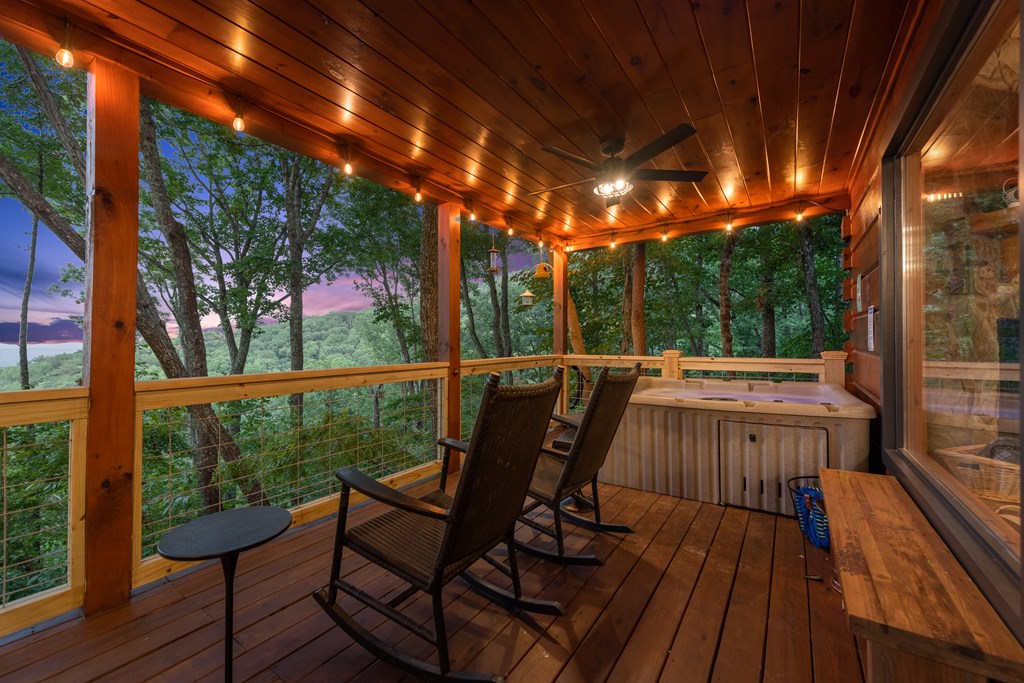 907 Ripshin Mountain Road Blue Ridge, GA 30513 - Photo 35 of 55 a view of a chairs and table in the balcony