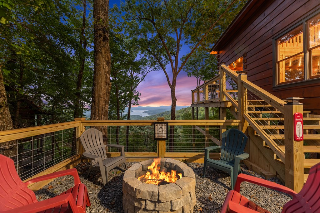907 Ripshin Mountain Road Blue Ridge, GA 30513 - Photo 42 of 55 a view of balcony with couch and wooden fence