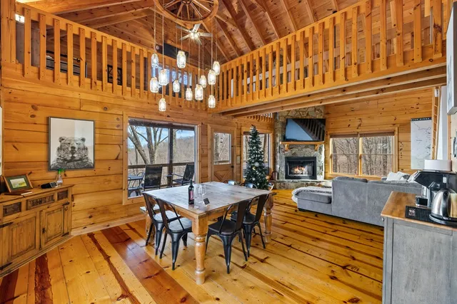 a view of a dining table and chairs in the patio