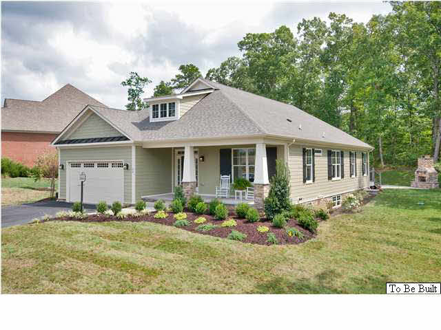 12 Timber Ridge Court Gordonsville, VA 22942 - Photo 2 of 31 a front view of a house with a garden and plants