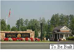 12 Timber Ridge Court Gordonsville, VA 22942 - Photo 22 of 31 a front view of a building with lots of trees and flowers