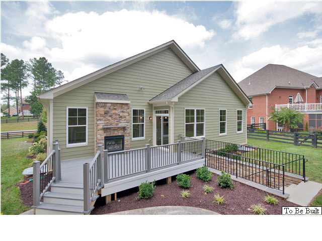 12 Timber Ridge Court Gordonsville, VA 22942 - Photo 3 of 31 a view of house with a deck and a yard with wooden fence