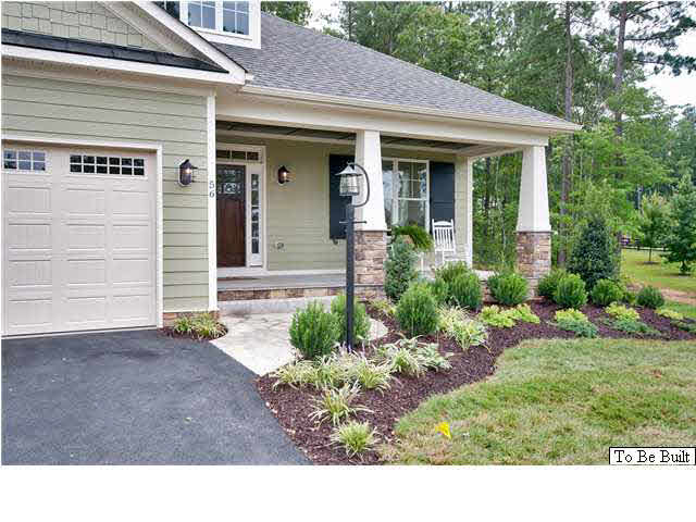 12 Timber Ridge Court Gordonsville, VA 22942 - Photo 6 of 31 a view of a house with potted plants and a table and chairs
