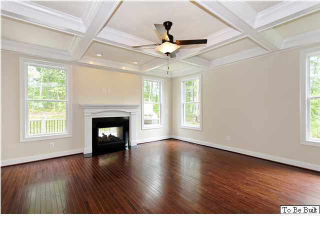 12 Timber Ridge Court Gordonsville, VA 22942 - Photo 9 of 31 a kitchen with wooden floors and fireplace