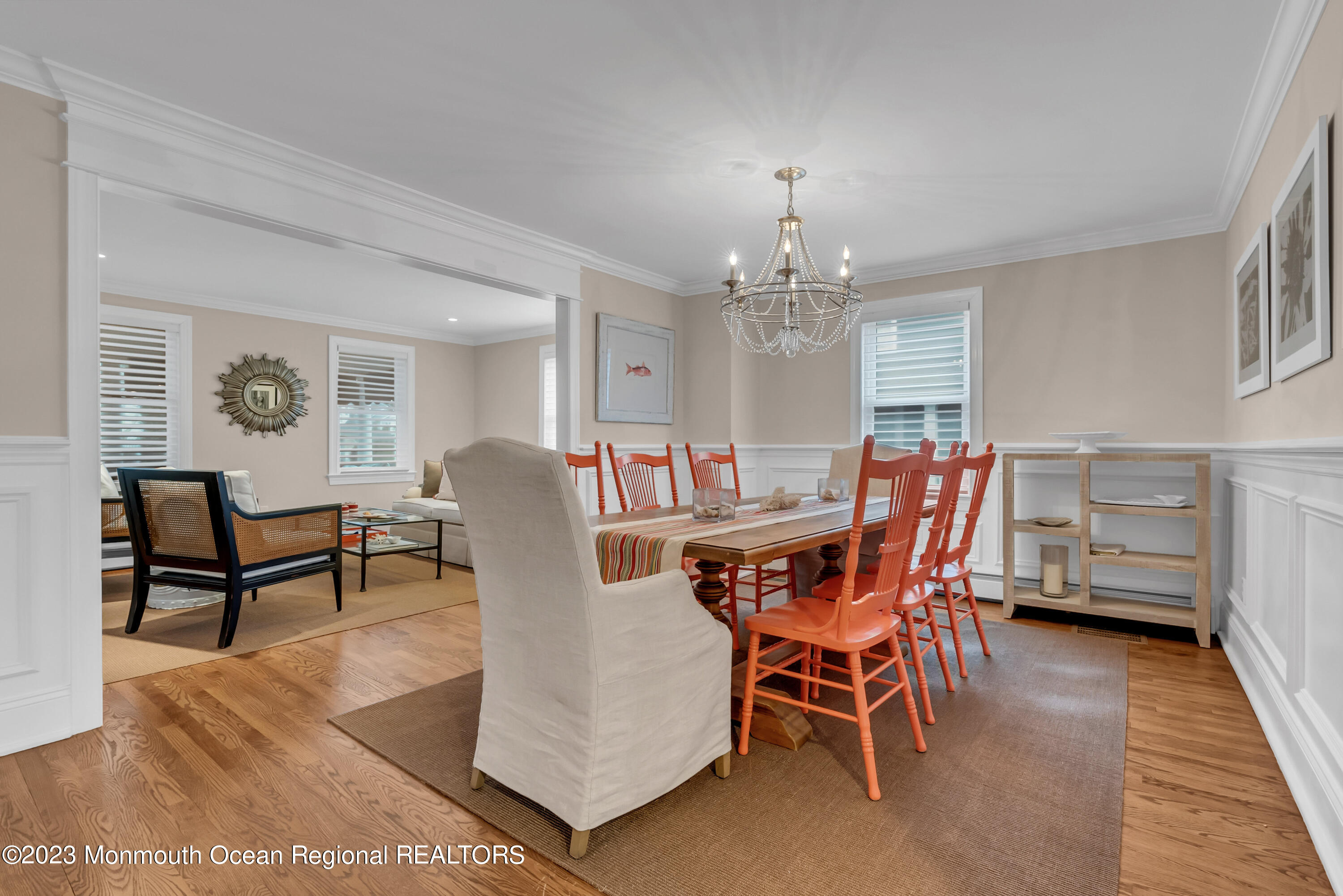 306 Worthington Avenue Spring Lake, NJ 07762 - Photo 13 of 52 a dining room with furniture a chandelier and wooden floor