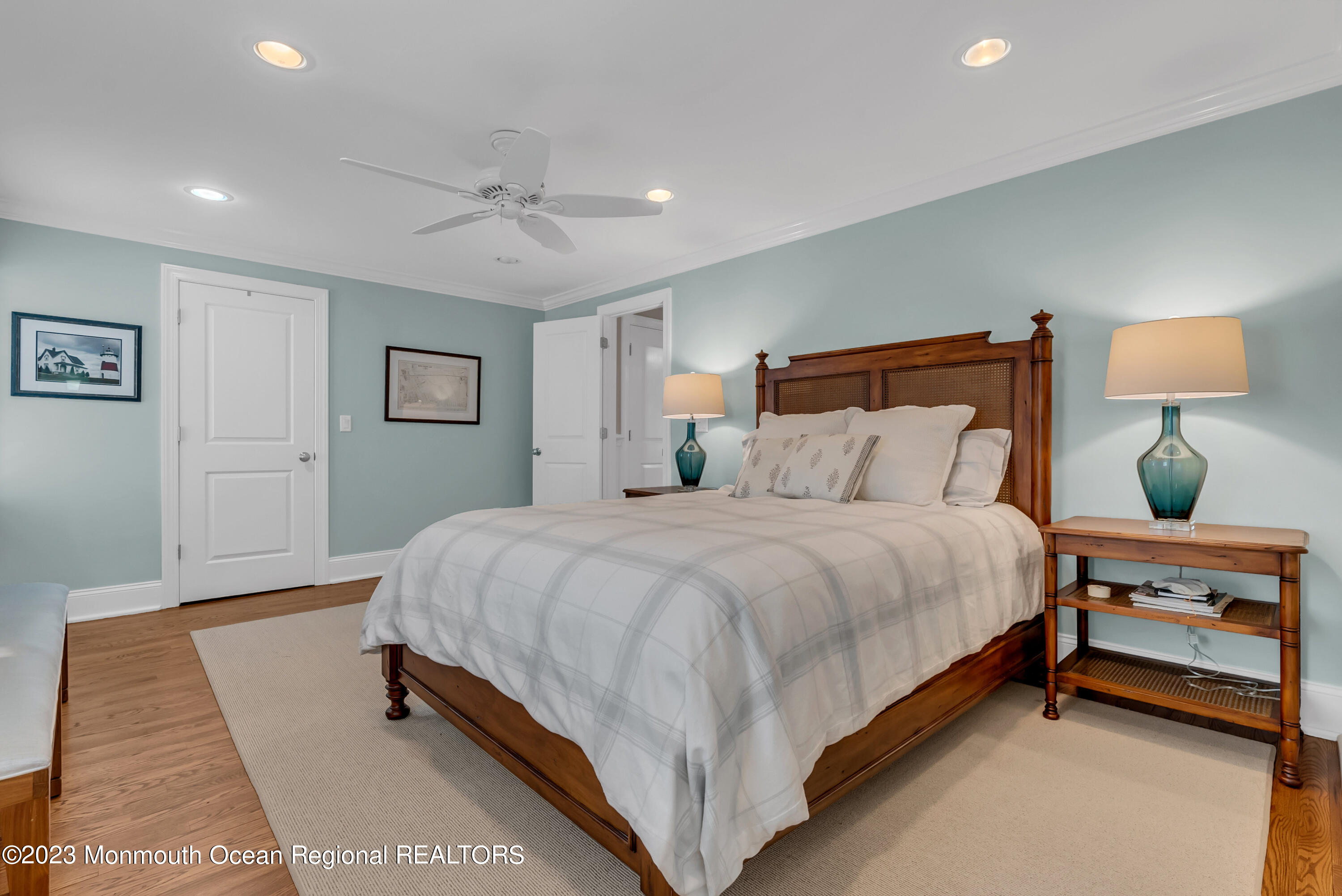 306 Worthington Avenue Spring Lake, NJ 07762 - Photo 24 of 52 a bedroom with a bed and a lamp
