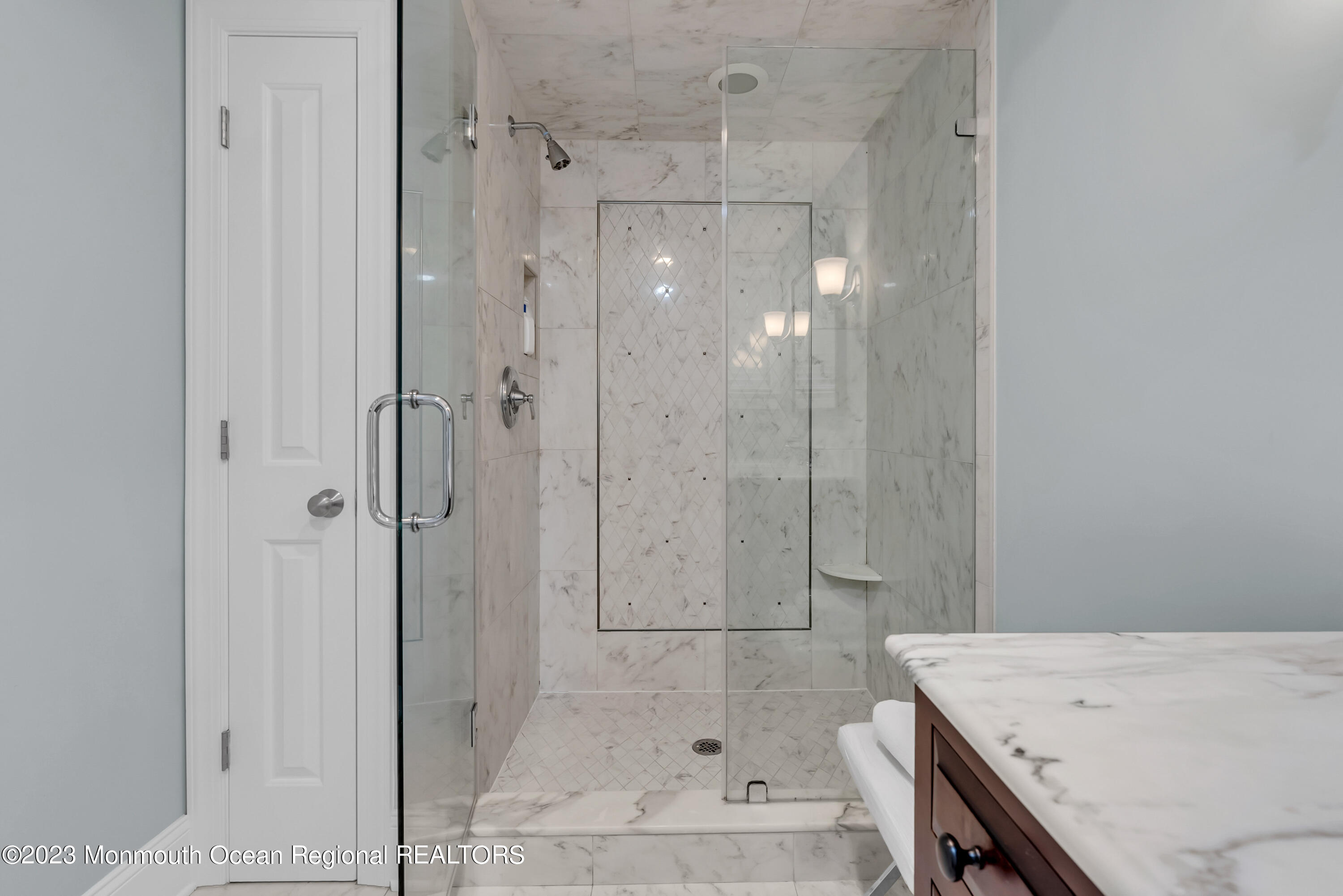 306 Worthington Avenue Spring Lake, NJ 07762 - Photo 26 of 52 a bathroom with a granite countertop sink a shower and mirror