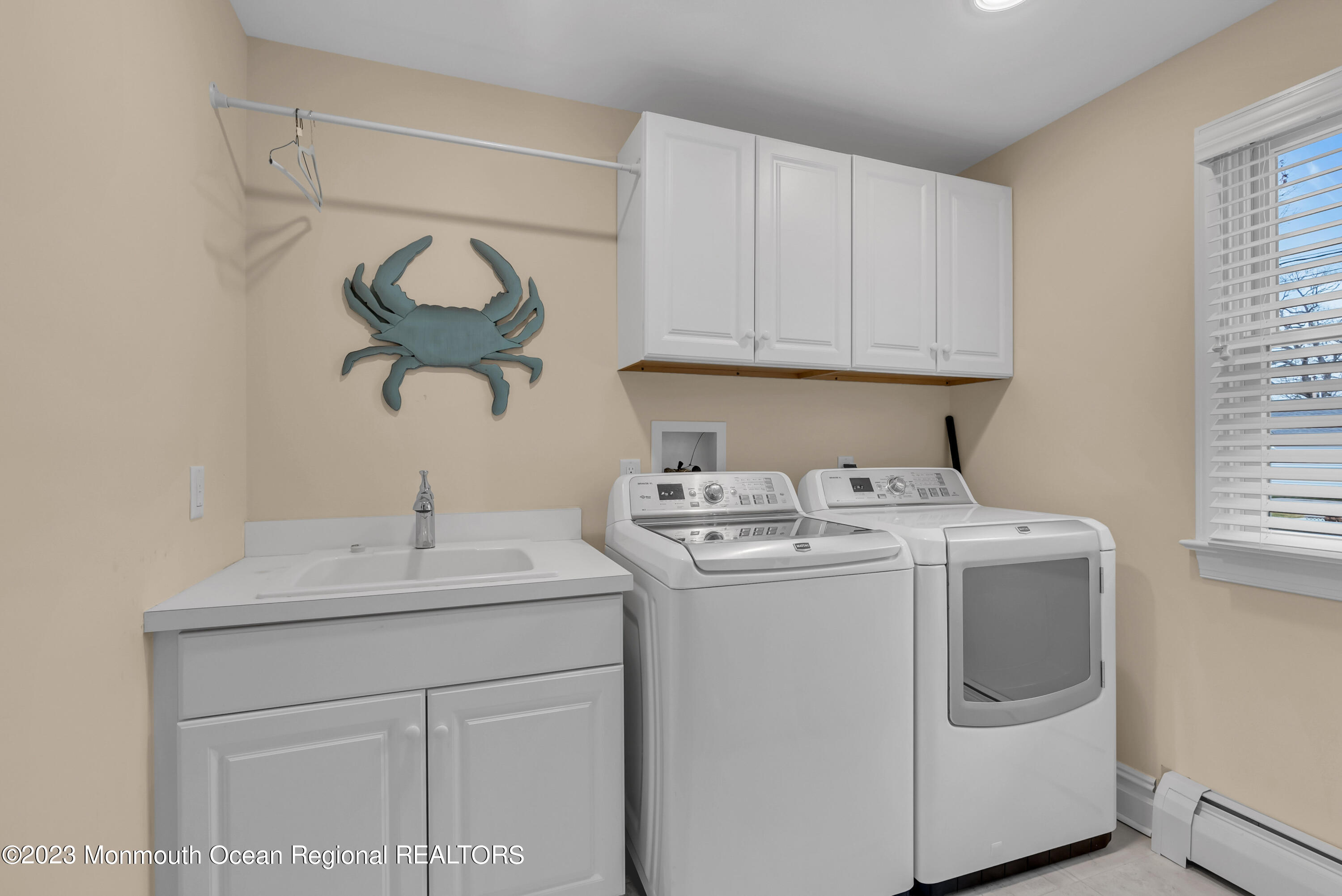 306 Worthington Avenue Spring Lake, NJ 07762 - Photo 27 of 52 a utility room with dryer and washer