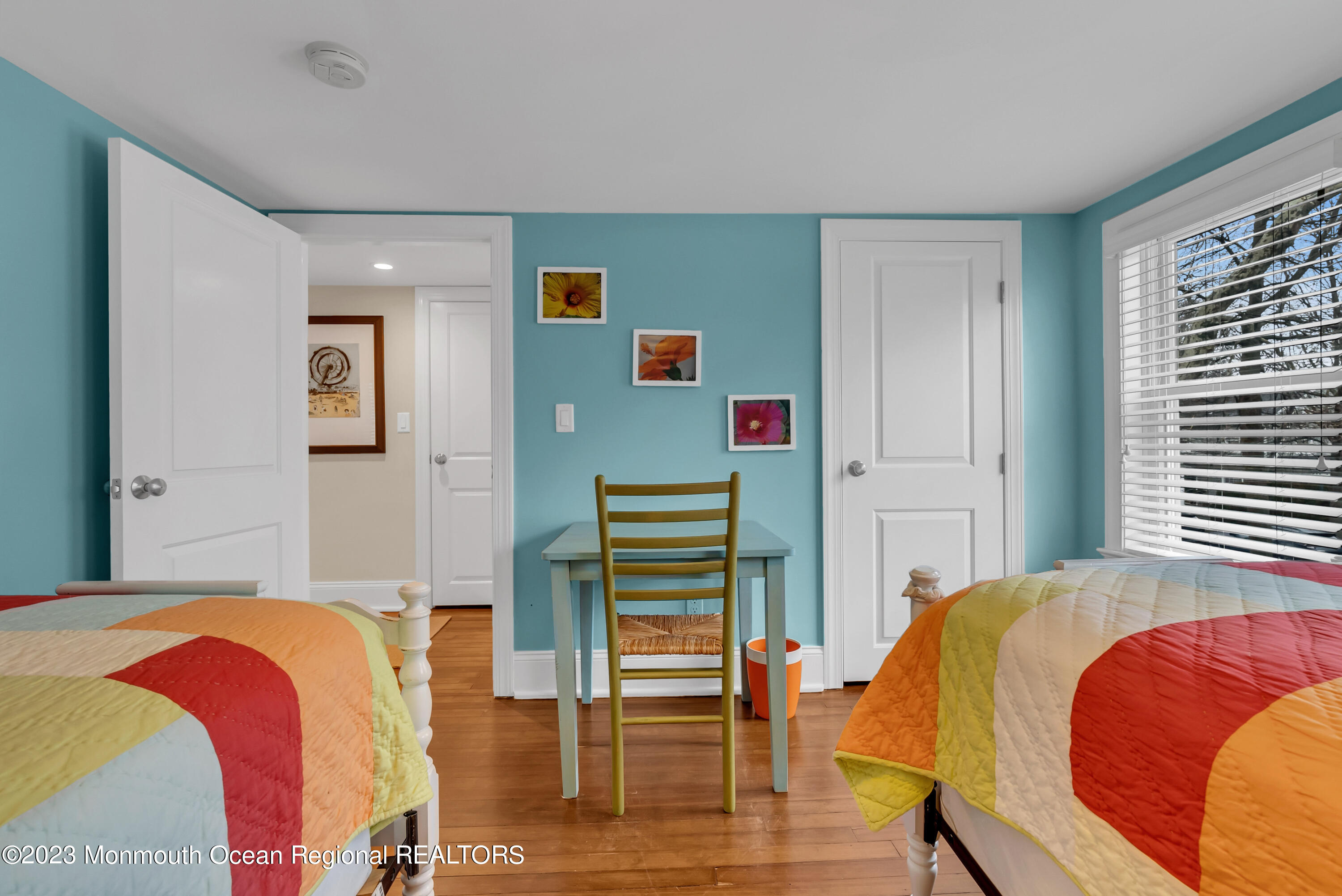 306 Worthington Avenue Spring Lake, NJ 07762 - Photo 32 of 52 a bedroom with a bed and a table in it