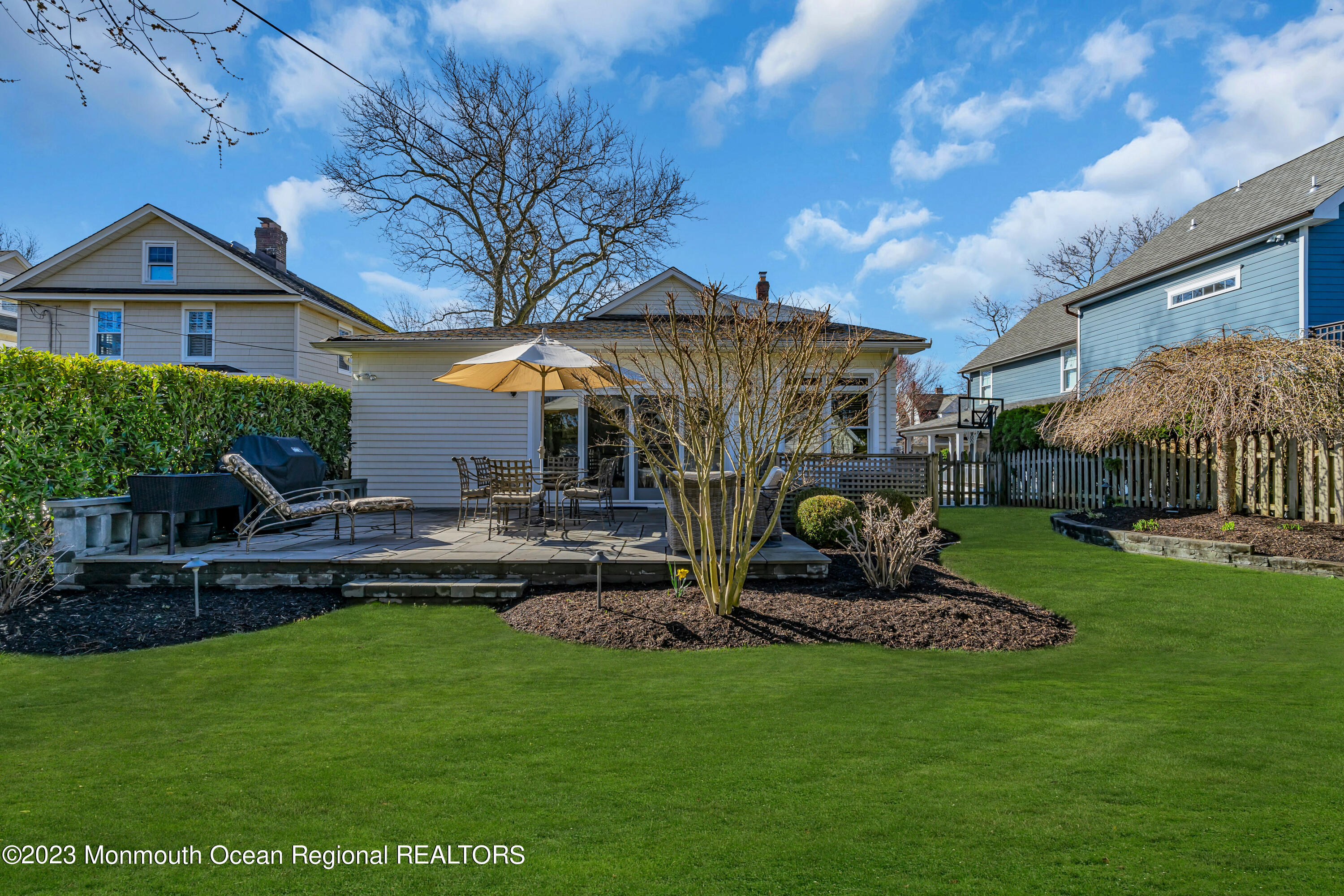 306 Worthington Avenue Spring Lake, NJ 07762 - Photo 35 of 52 a front view of a house with a garden