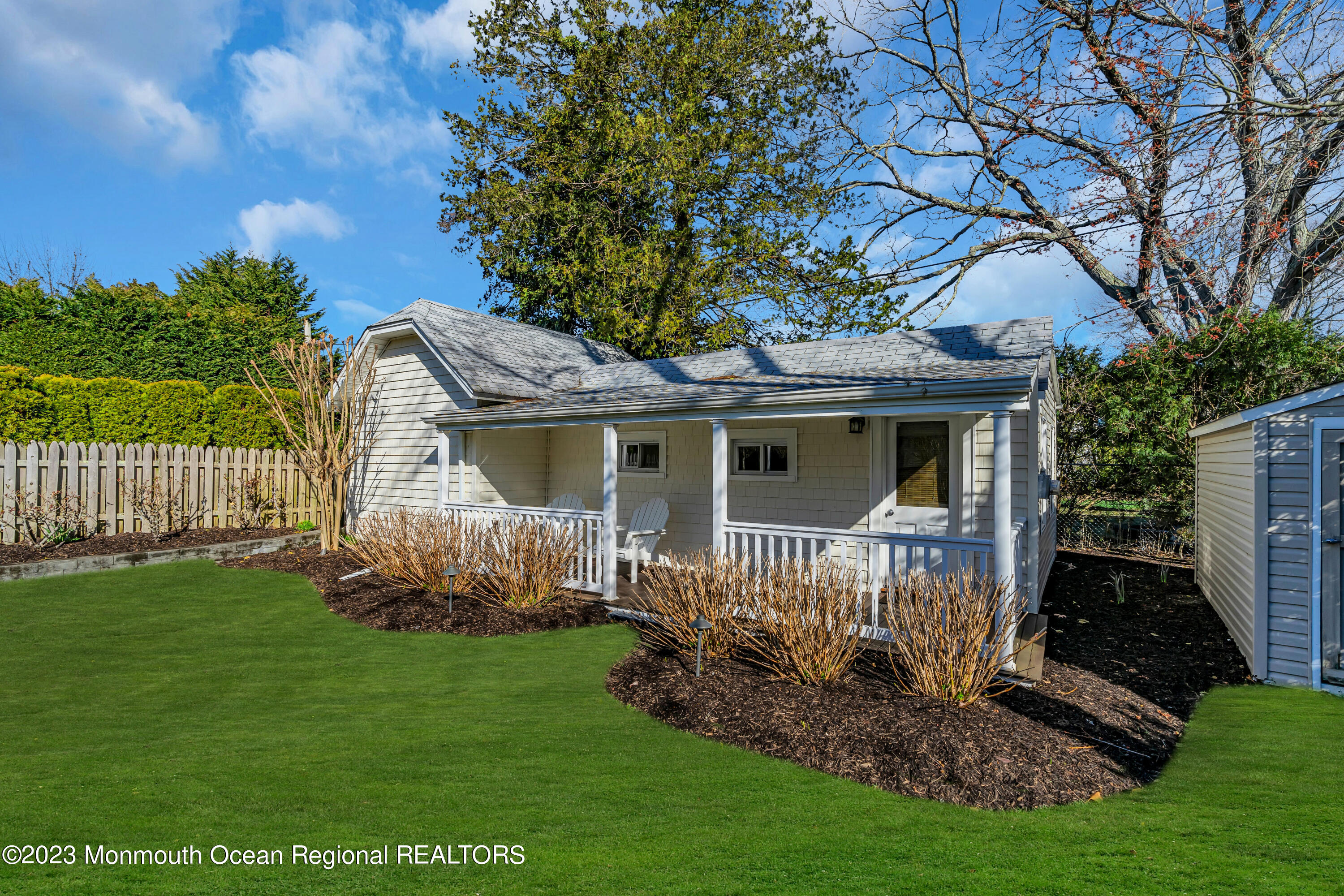 306 Worthington Avenue Spring Lake, NJ 07762 - Photo 37 of 52 a front view of a house with garden