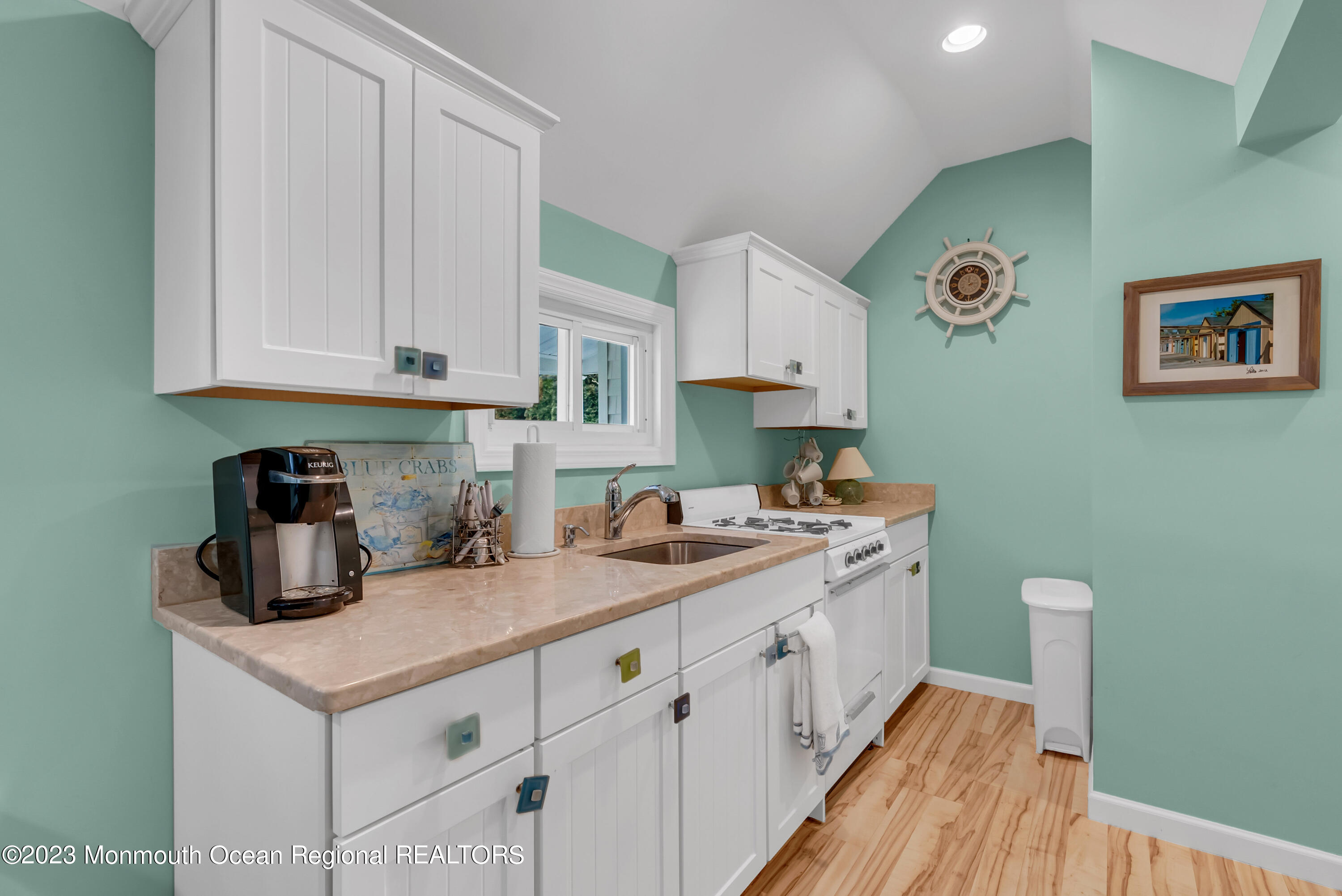 306 Worthington Avenue Spring Lake, NJ 07762 - Photo 40 of 52 a kitchen with a sink stove and cabinets