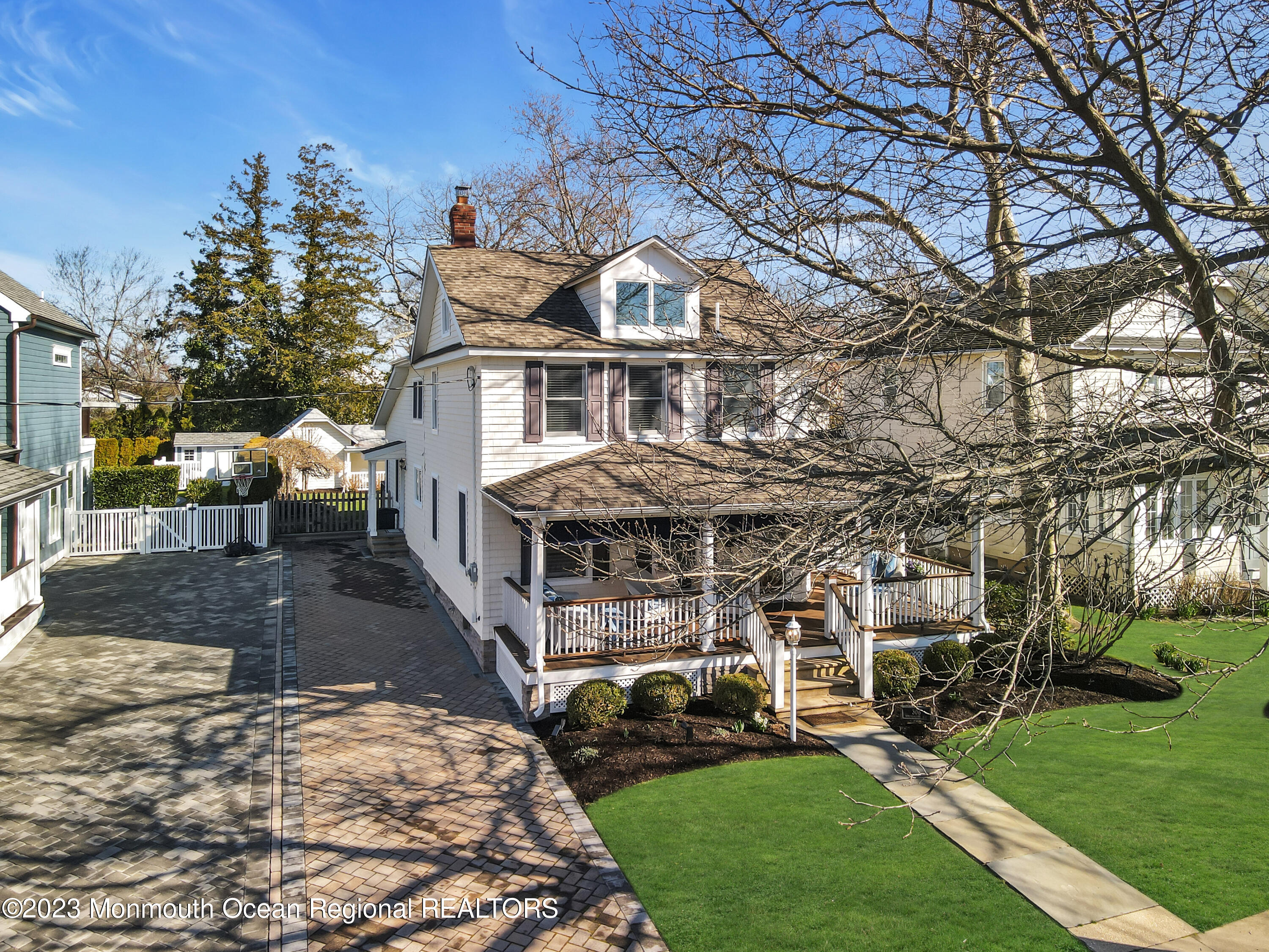 306 Worthington Avenue Spring Lake, NJ 07762 - Photo 49 of 52 a front view of a house with a yard