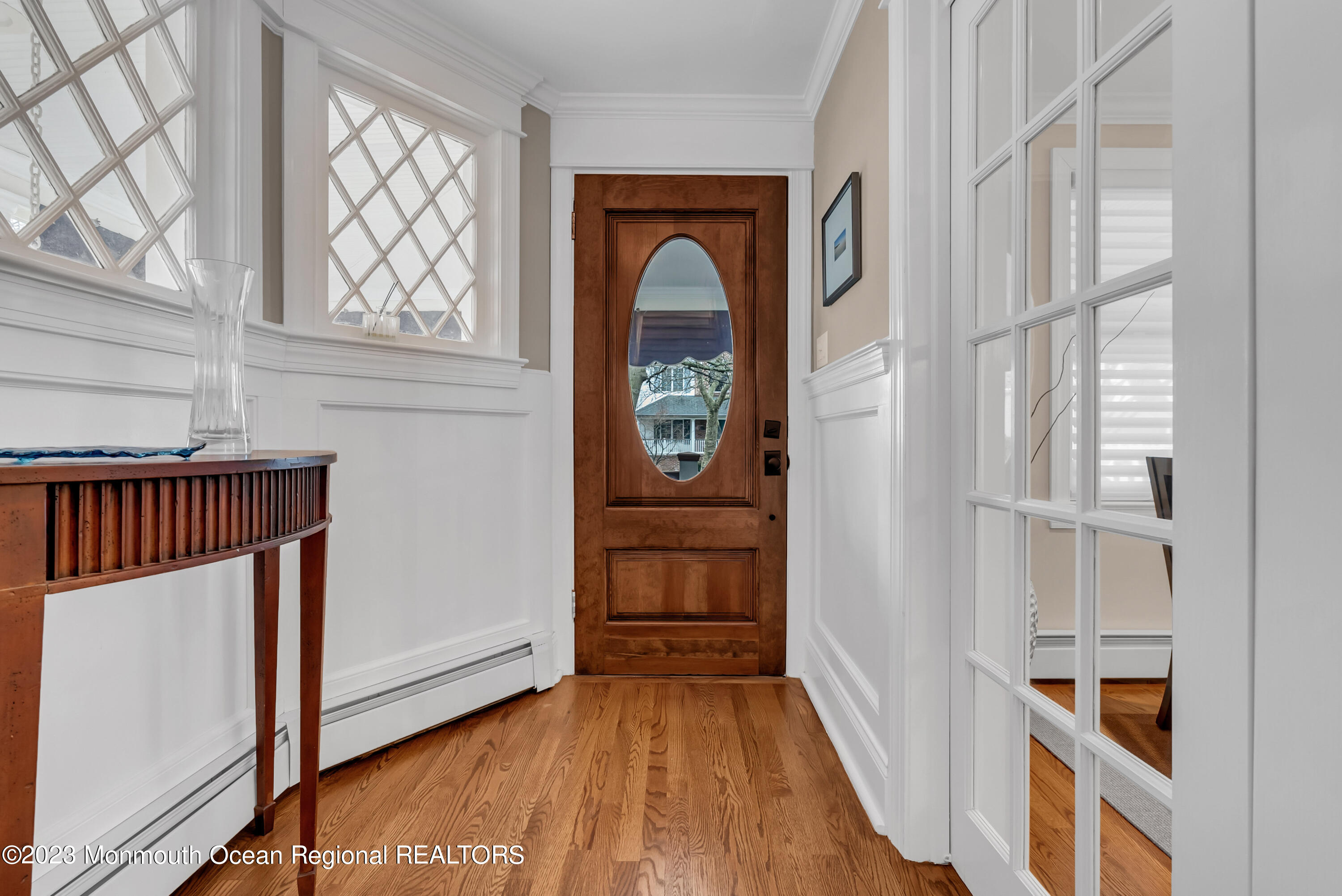 306 Worthington Avenue Spring Lake, NJ 07762 - Photo 6 of 52 a view of front door with wooden floor