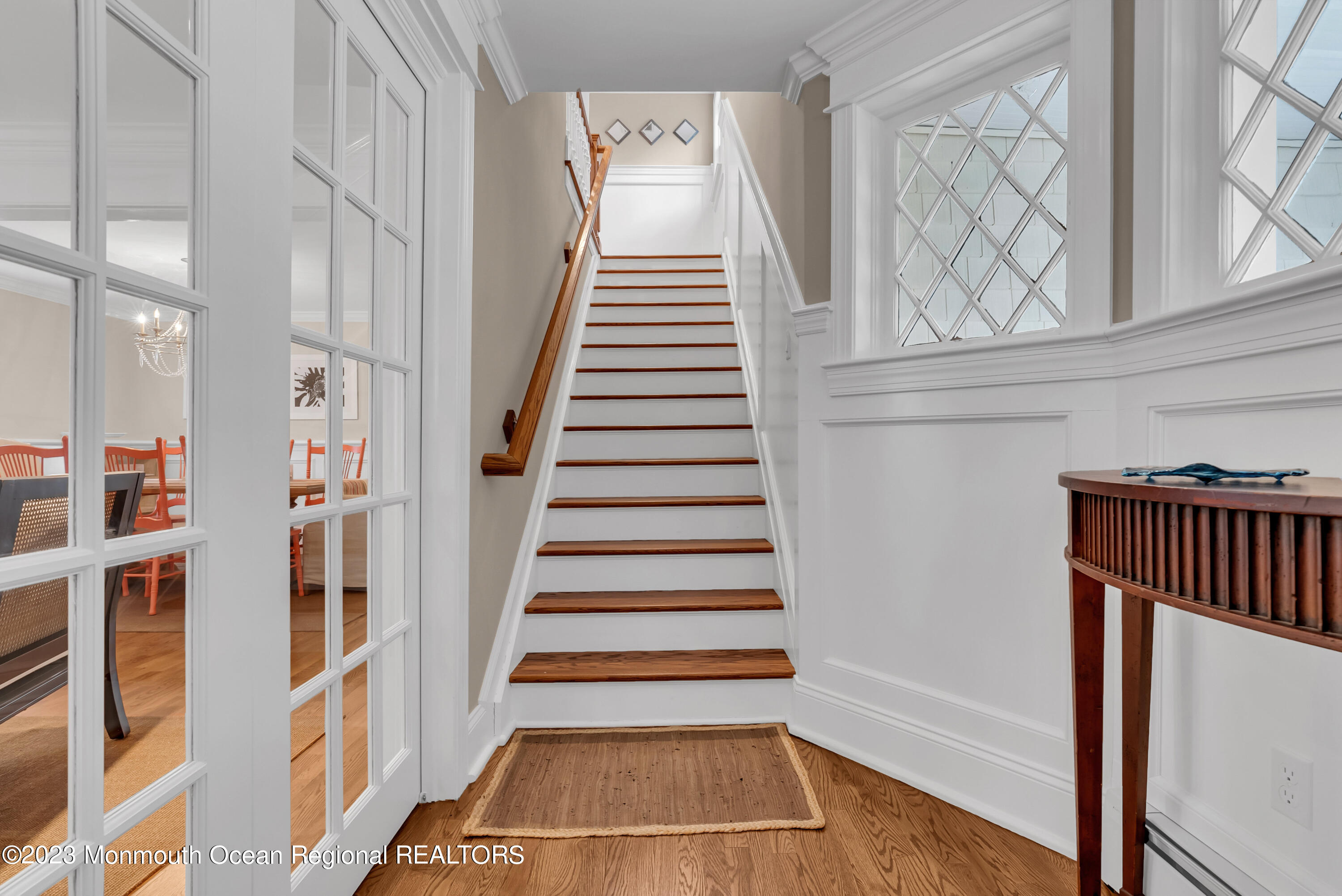306 Worthington Avenue Spring Lake, NJ 07762 - Photo 7 of 52 a view of entryway with wooden floor and stairs