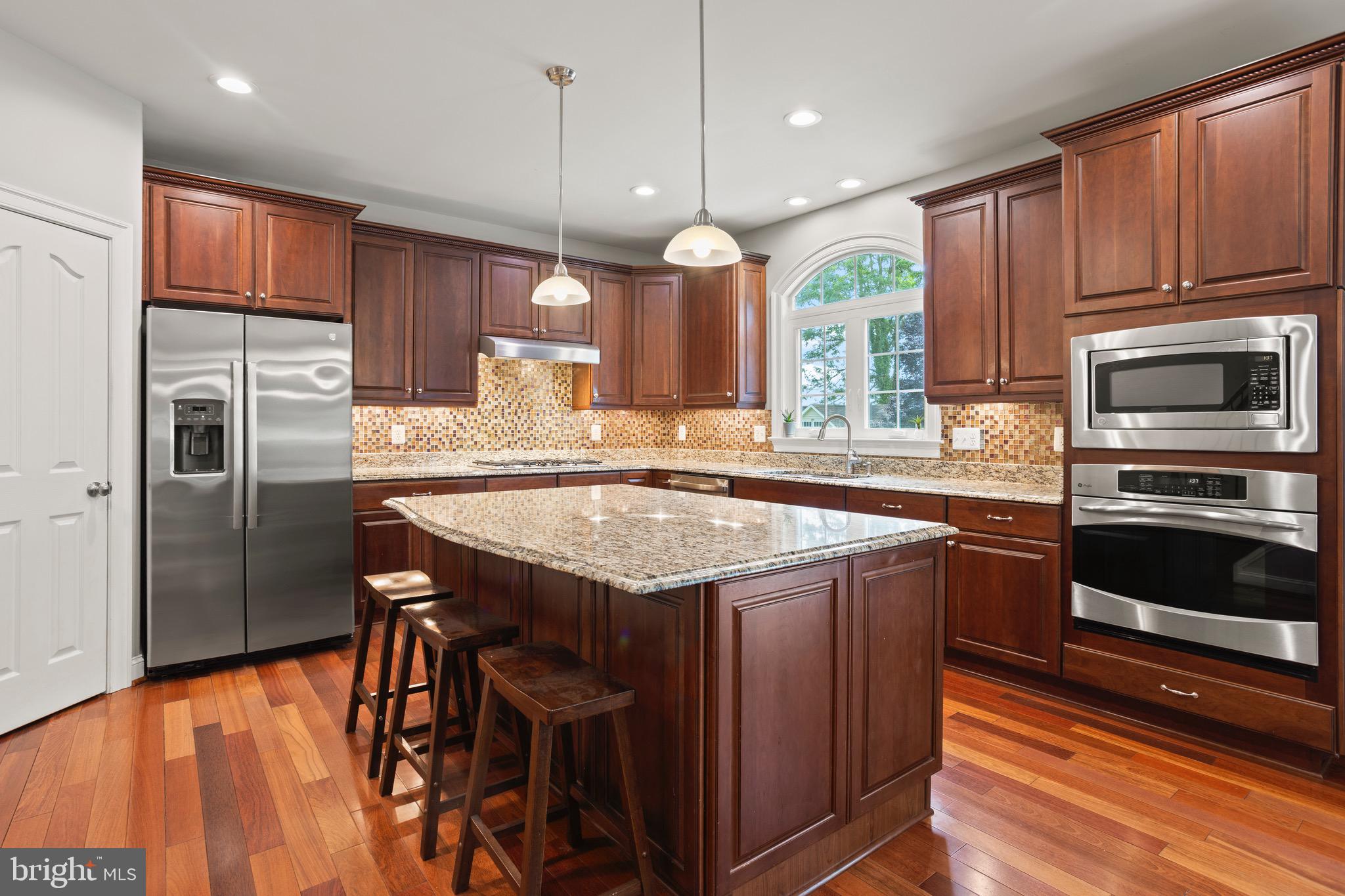 3325 Cox Road Chesapeake Beach, MD 20732 - Photo 13 of 127 Large island w/ room for chairs/stools