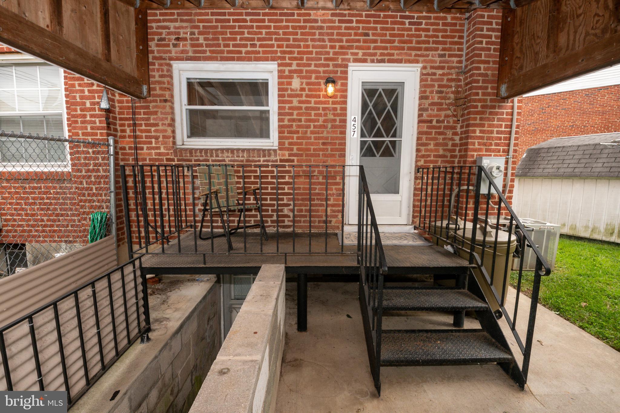 457 Torner Road Baltimore, MD 21221 - Photo 31 of 59 Back View / Custom built iron dec