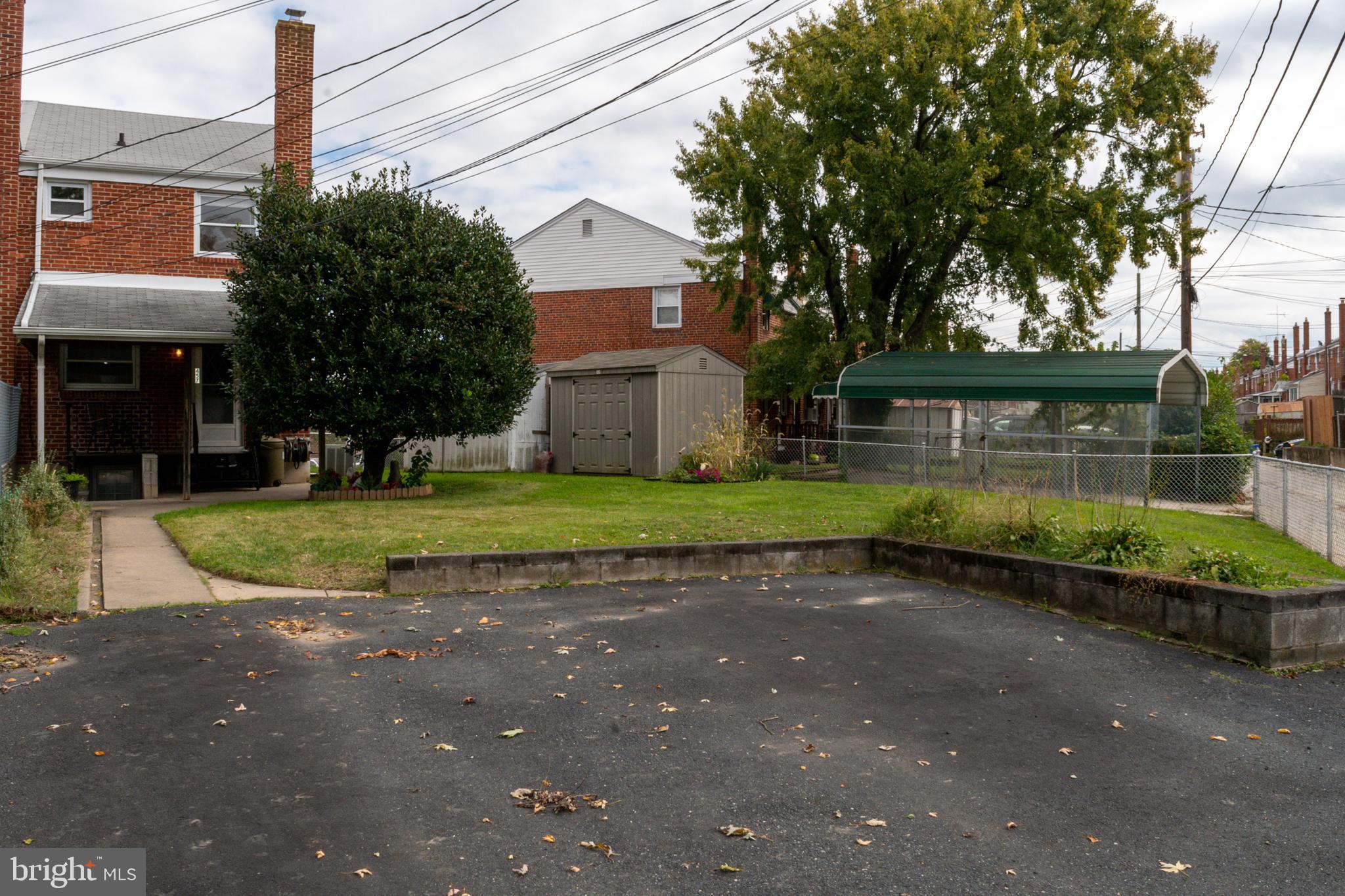 457 Torner Road Baltimore, MD 21221 - Photo 35 of 59 Back view from alley of parking 2-car parking pad