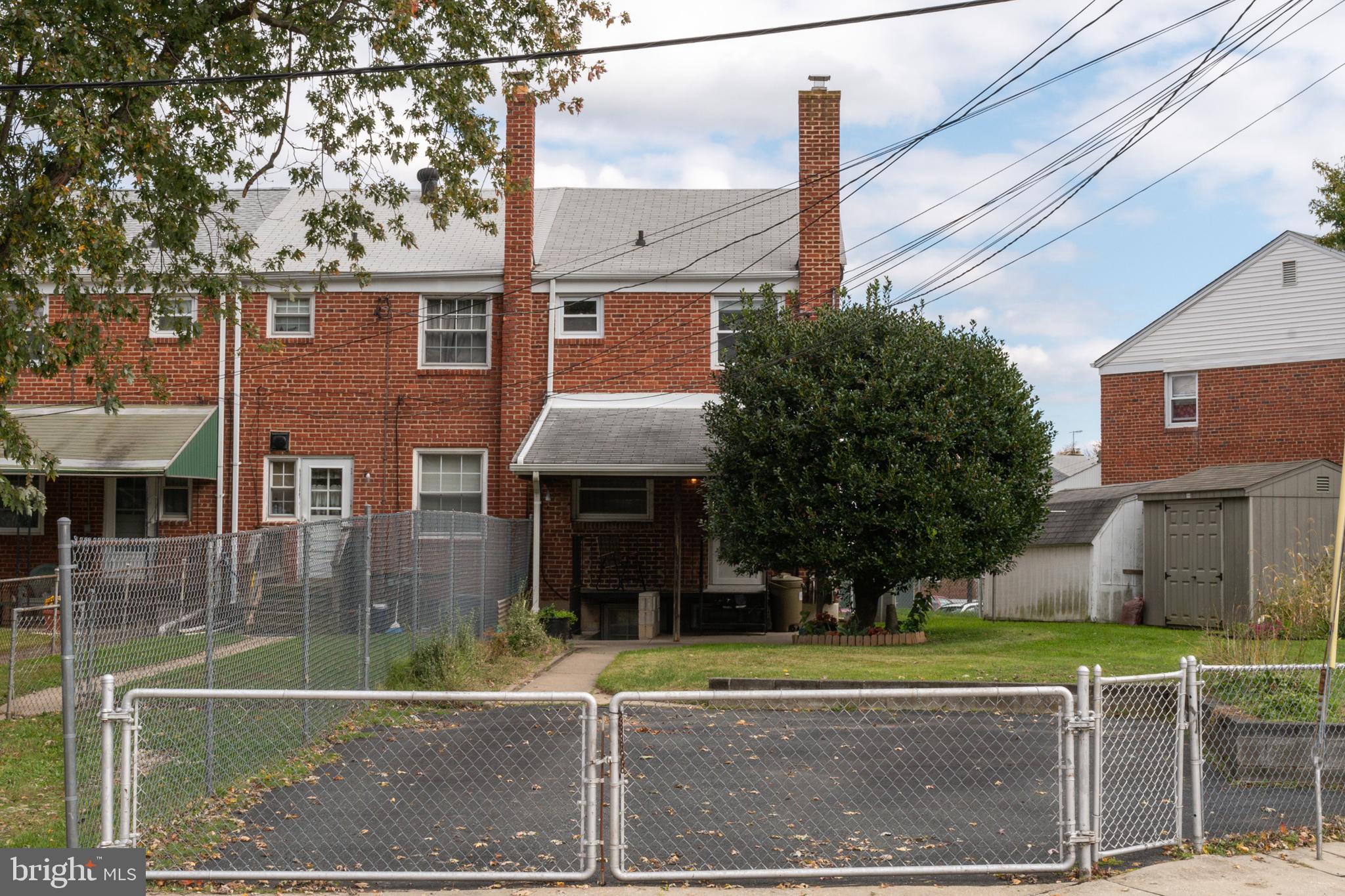 457 Torner Road Baltimore, MD 21221 - Photo 36 of 59 Back view of the fenced in parking pad and yard