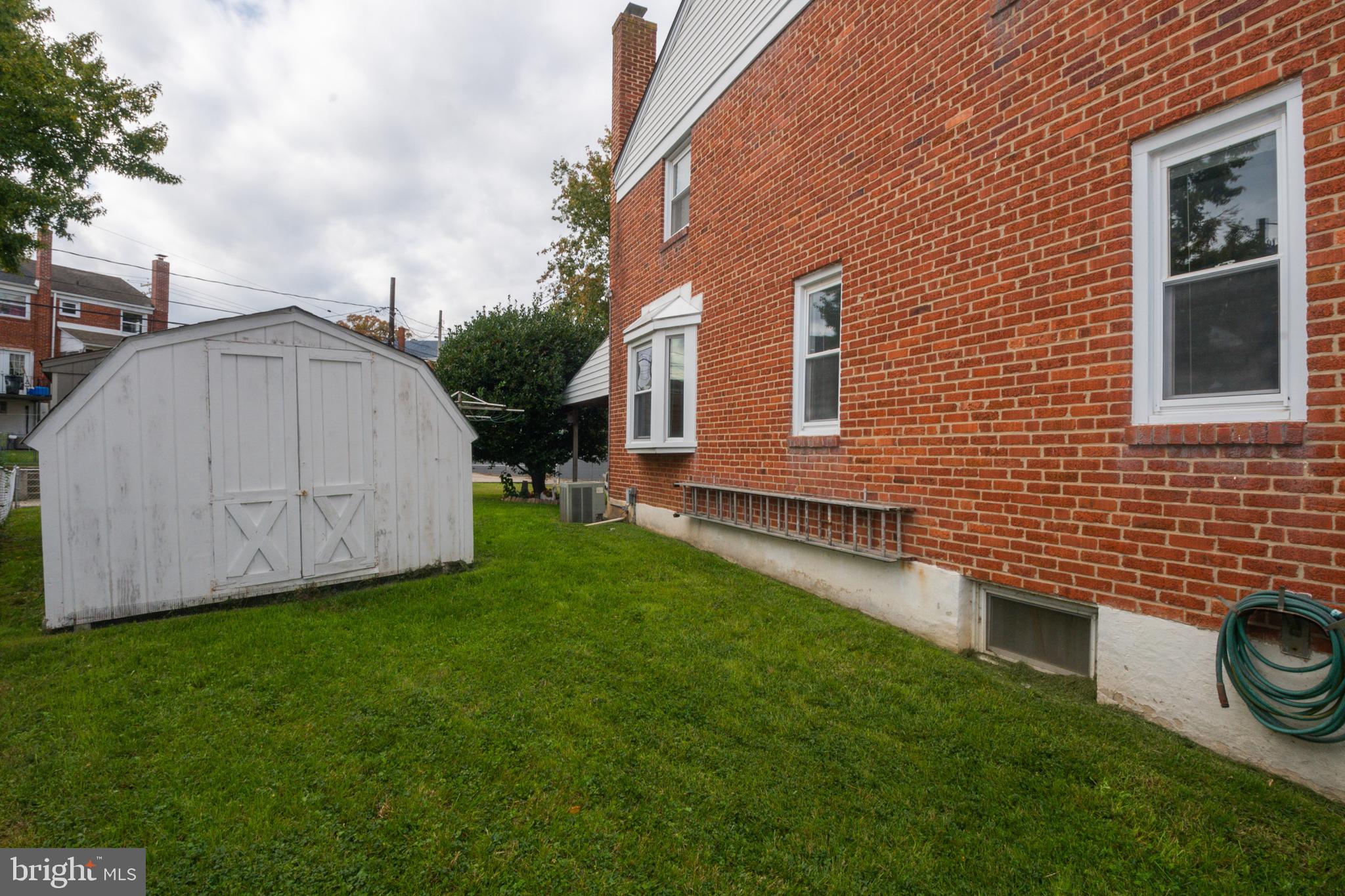457 Torner Road Baltimore, MD 21221 - Photo 42 of 59 Side yard with sheds