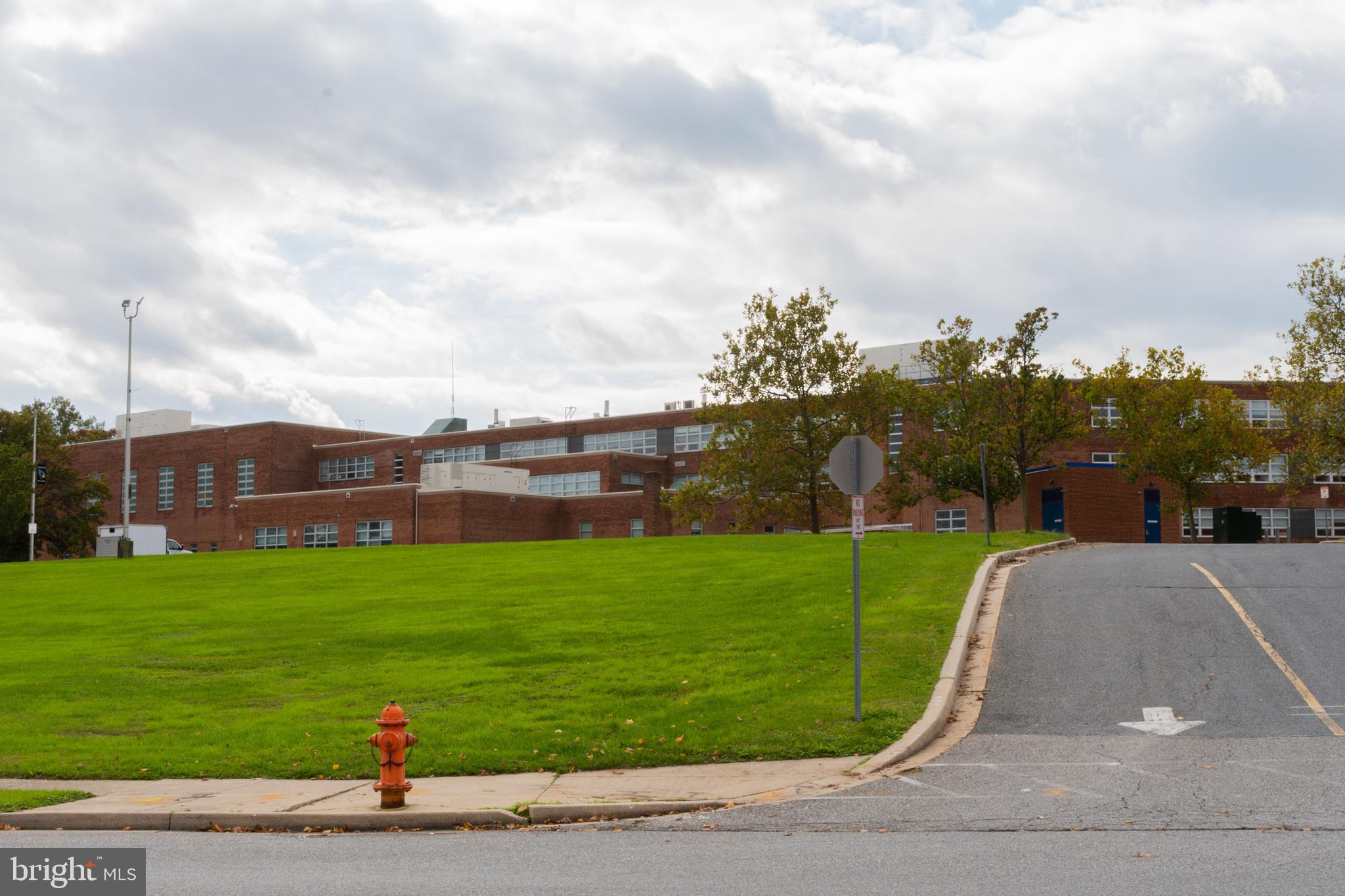 457 Torner Road Baltimore, MD 21221 - Photo 58 of 59 Kenwood high school view from alley