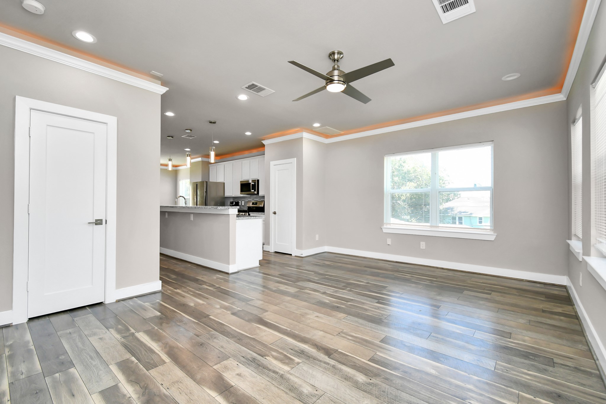 3538 Noah Street Houston, TX 77021 - Photo 11 of 33 a view of a kitchen with wooden floor and a window