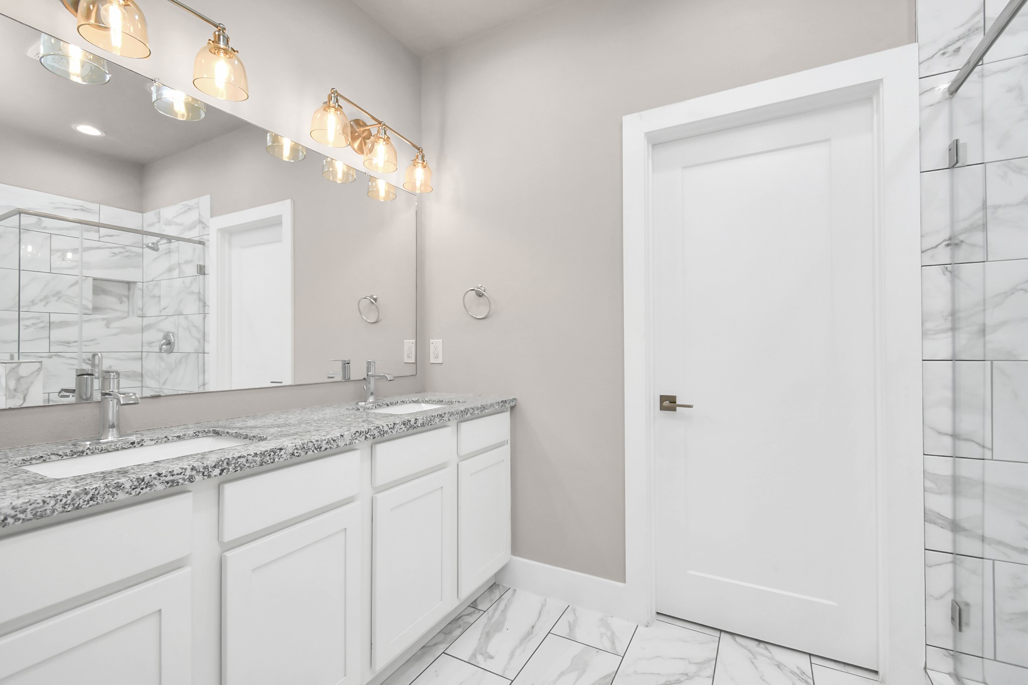 3538 Noah Street Houston, TX 77021 - Photo 22 of 33 a bathroom with a granite countertop sink and a mirror