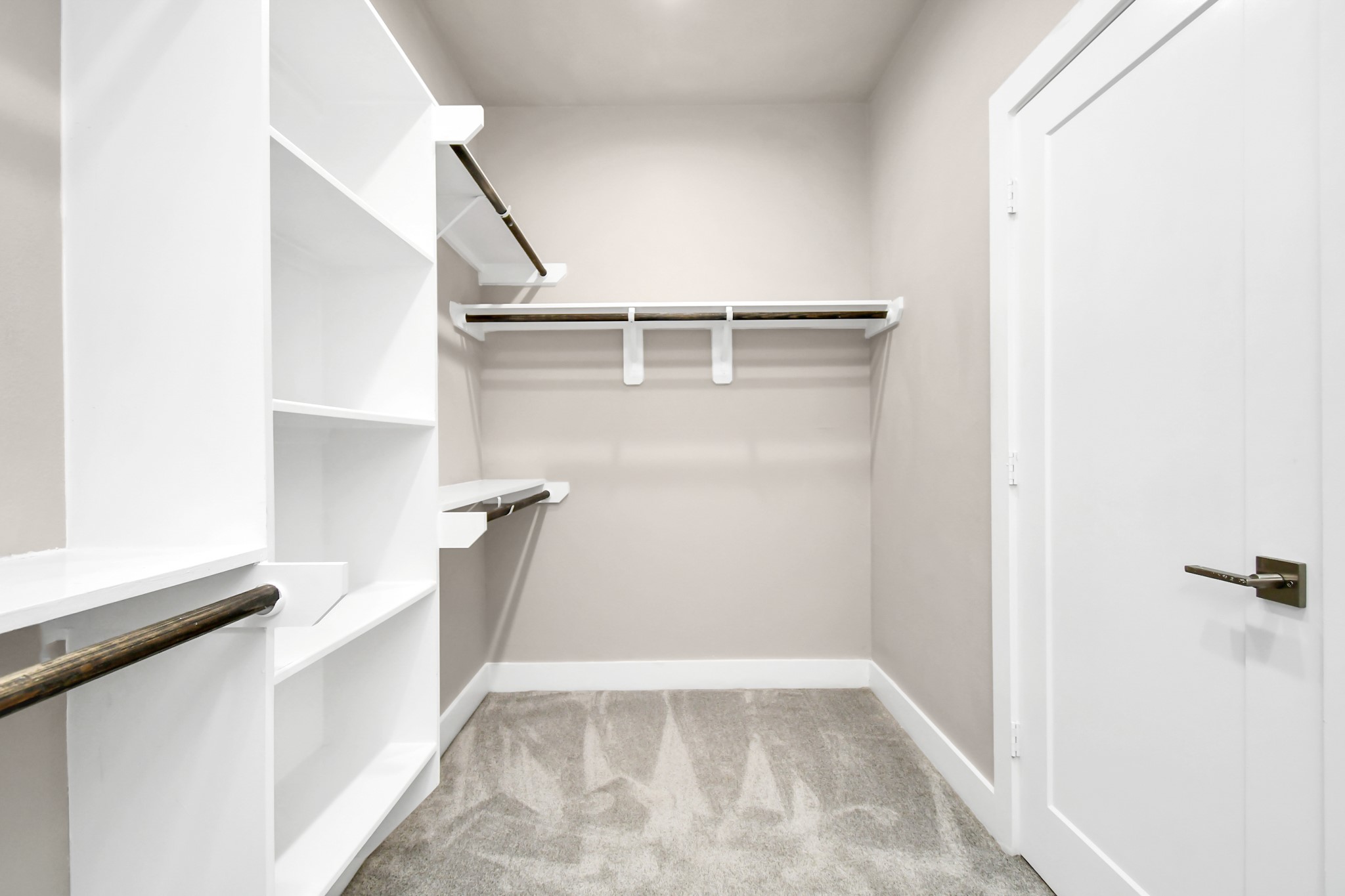 3538 Noah Street Houston, TX 77021 - Photo 25 of 33 a view of walk in closet with empty racks