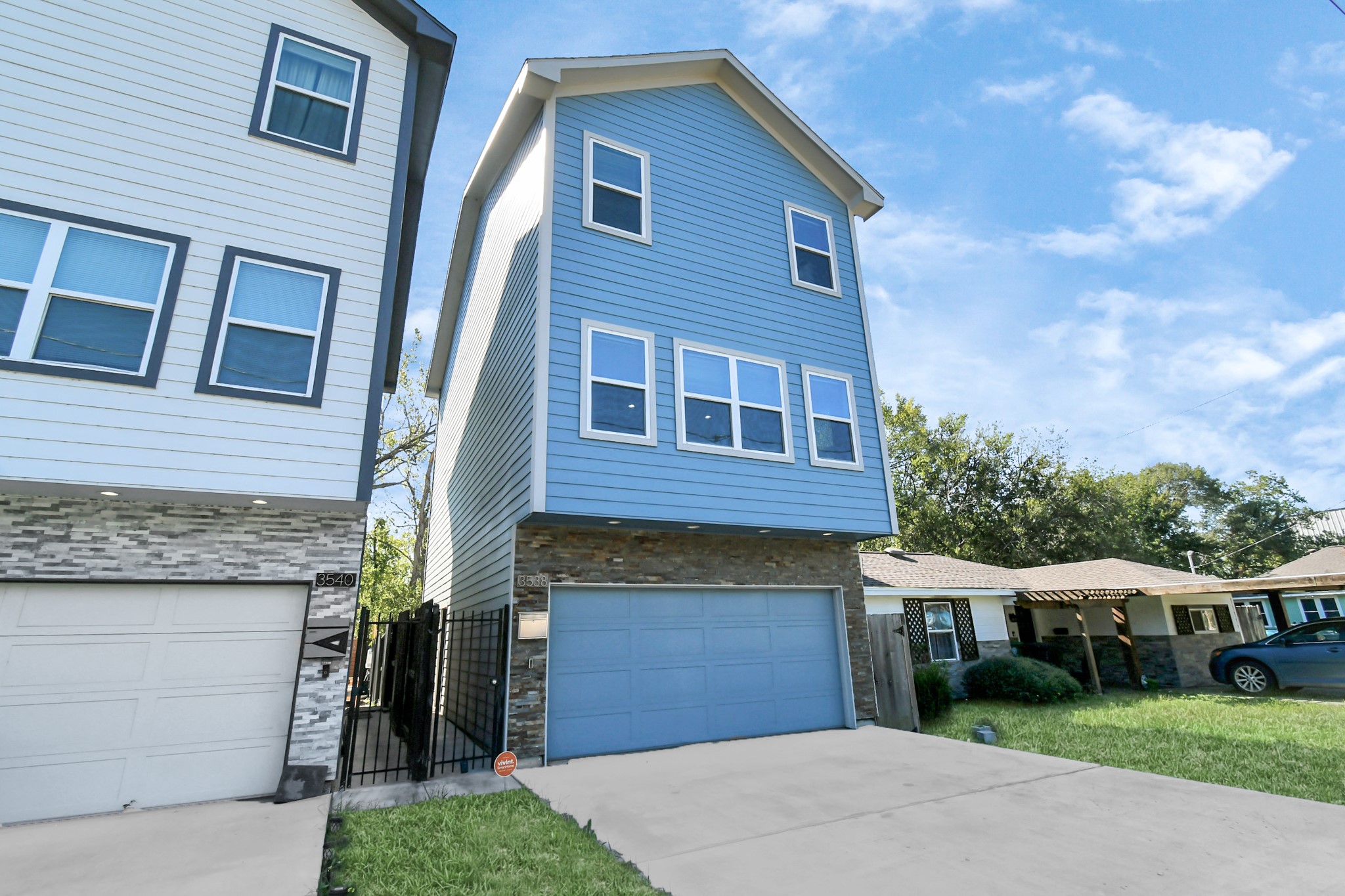 3538 Noah Street Houston, TX 77021 - Photo 29 of 33 a view of a brick house with a yard plants and large tree