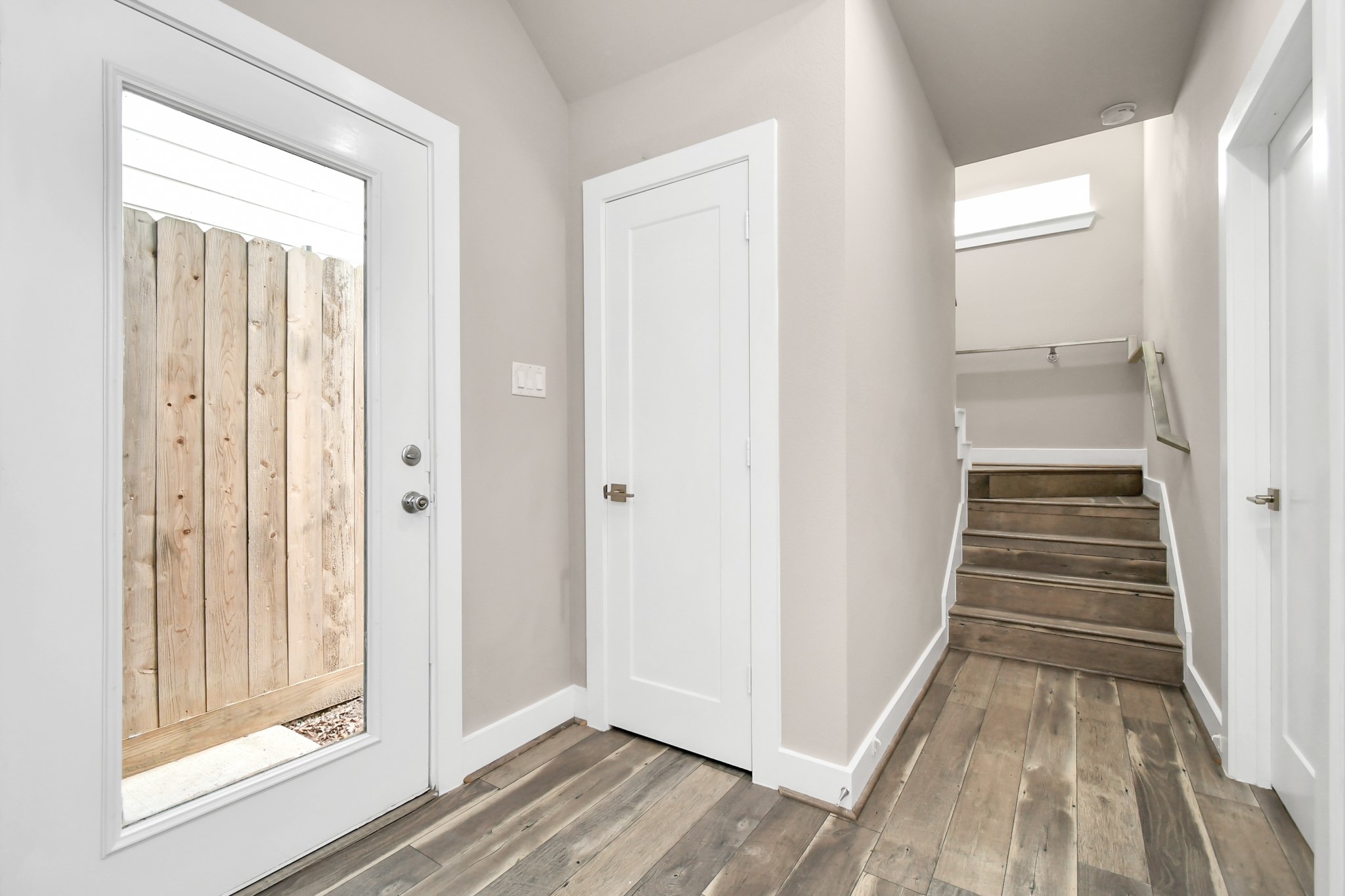 3538 Noah Street Houston, TX 77021 - Photo 3 of 33 an empty room with wooden floor and entryway