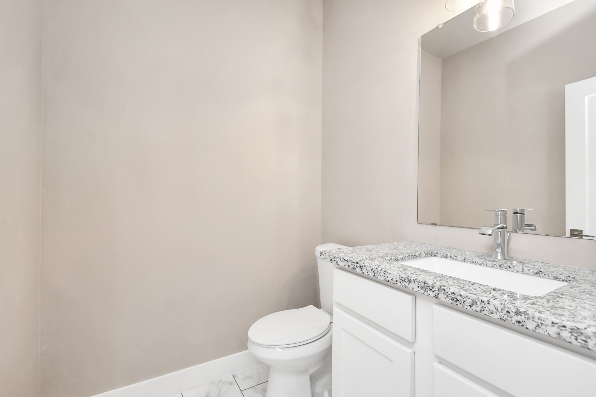 3538 Noah Street Houston, TX 77021 - Photo 7 of 33 a bathroom with a granite countertop sink and a toilet