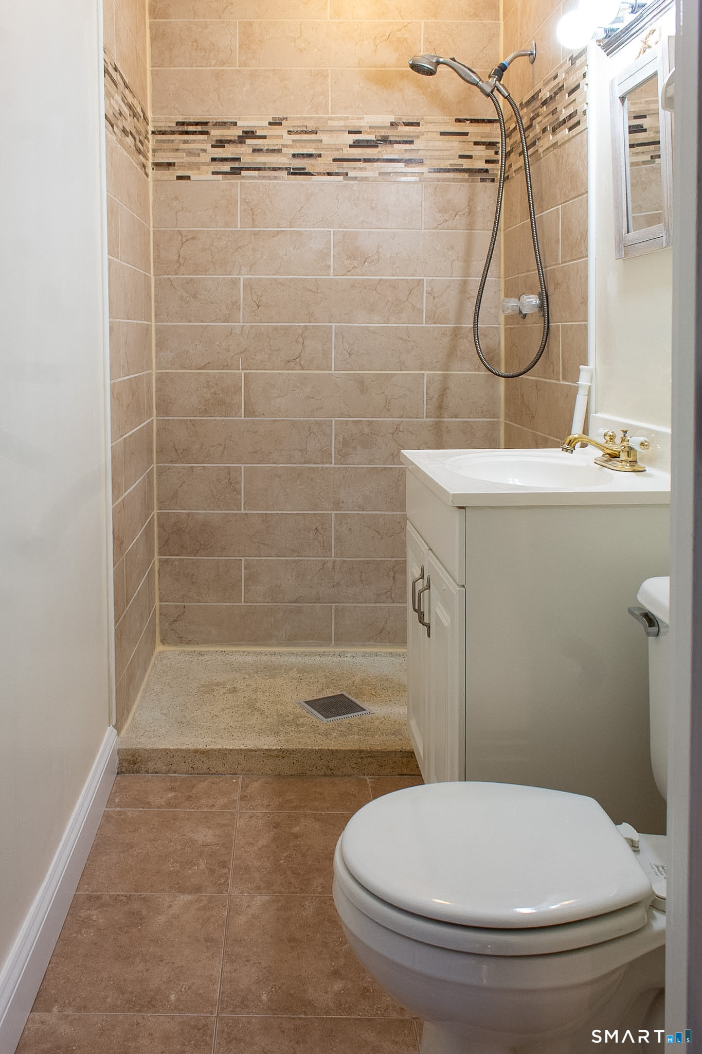 10 Georgetown Drive, Unit J Enfield, CT 06082 - Photo 13 of 15 a bathroom with a toilet and a shower