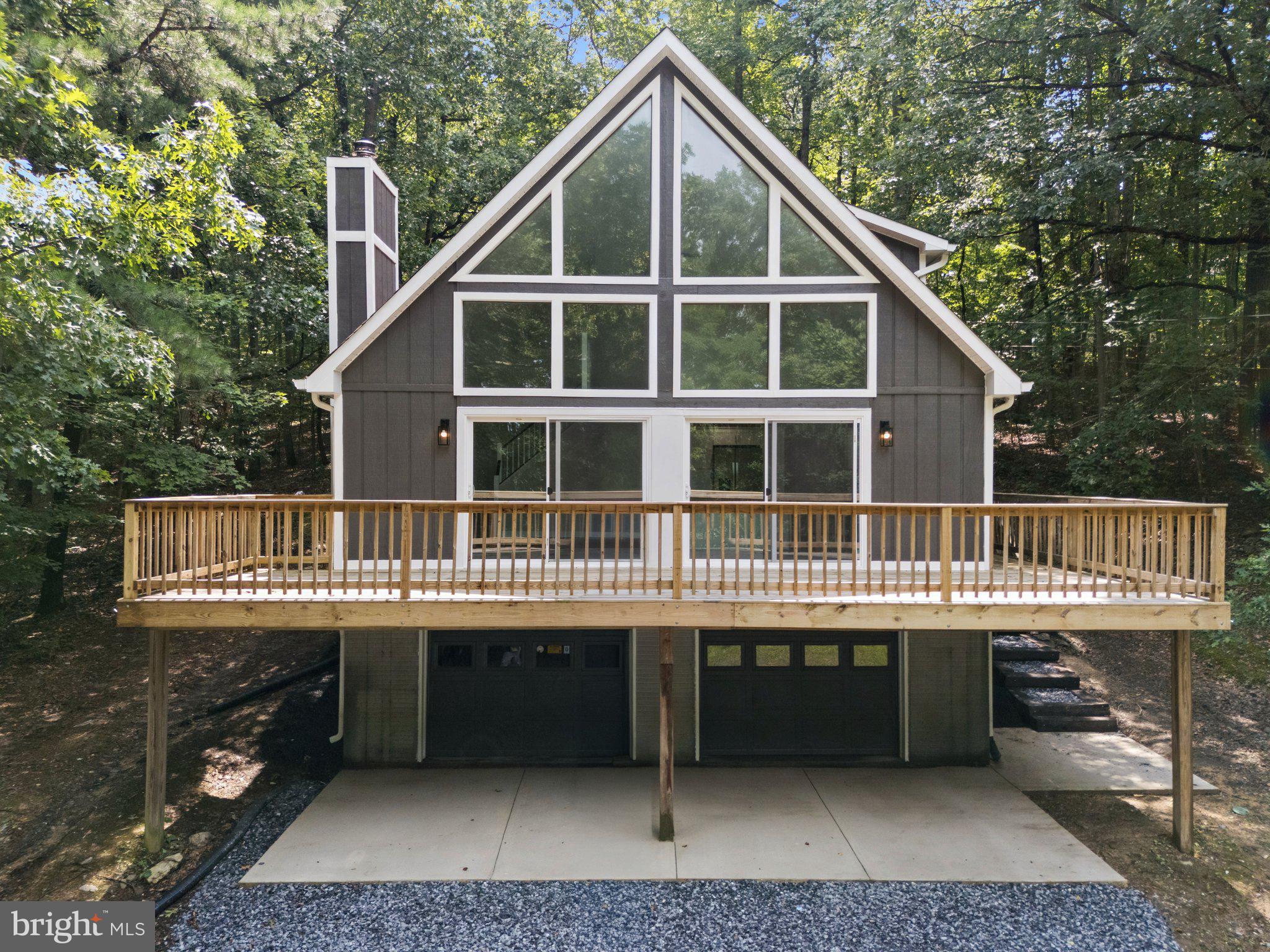 576 Manor Road Front Royal, VA 22630 - Photo 1 of 41 Charming chalet nestled in nature.
