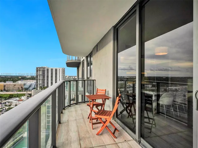 a view of a potted plant in a corridor