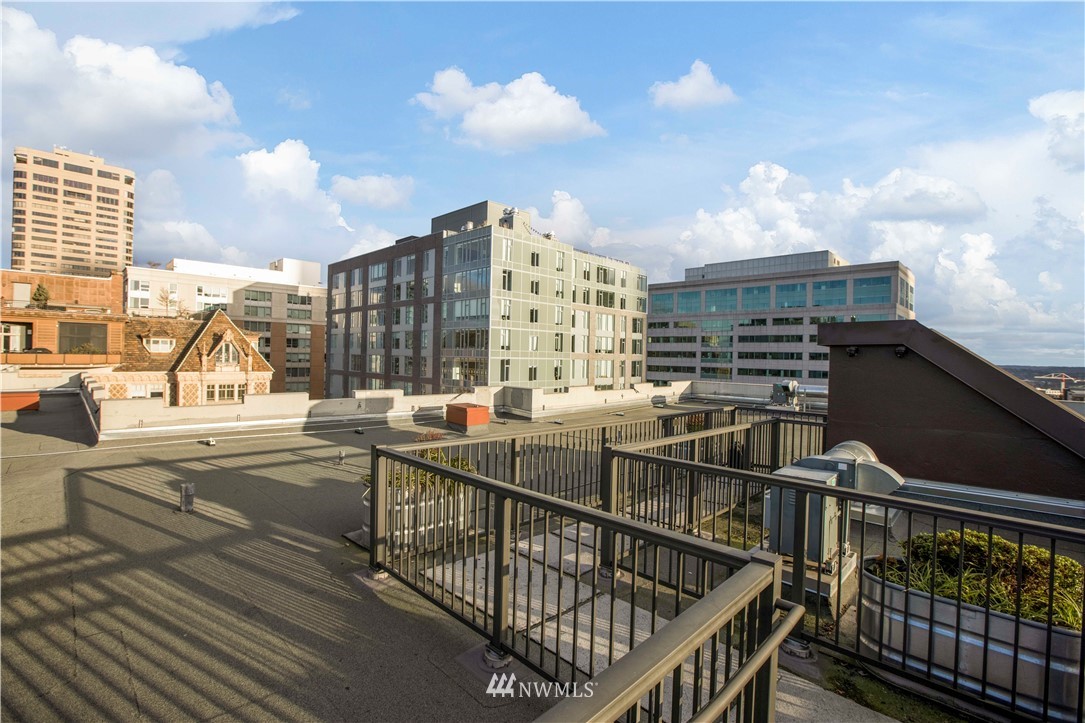 1105 Spring Street, Unit 1006 Seattle, WA 98104 - Photo 22 of 22 a view of balcony with city view