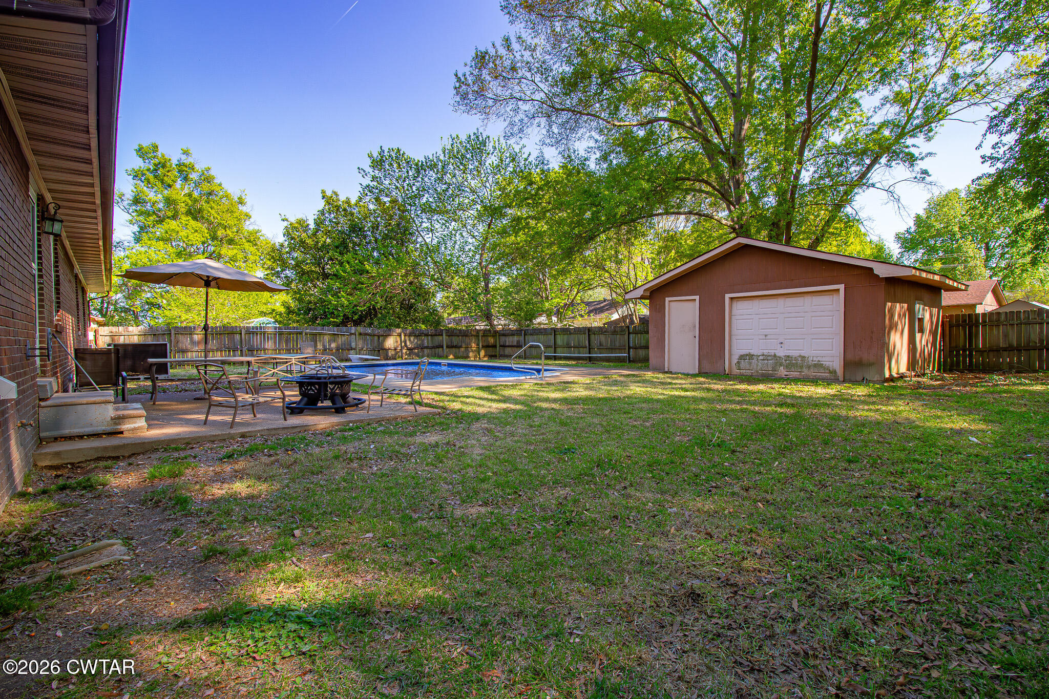 3075 Arnold Street Milan, TN 38358 - Photo 23 of 24 a view of a house with backyard
