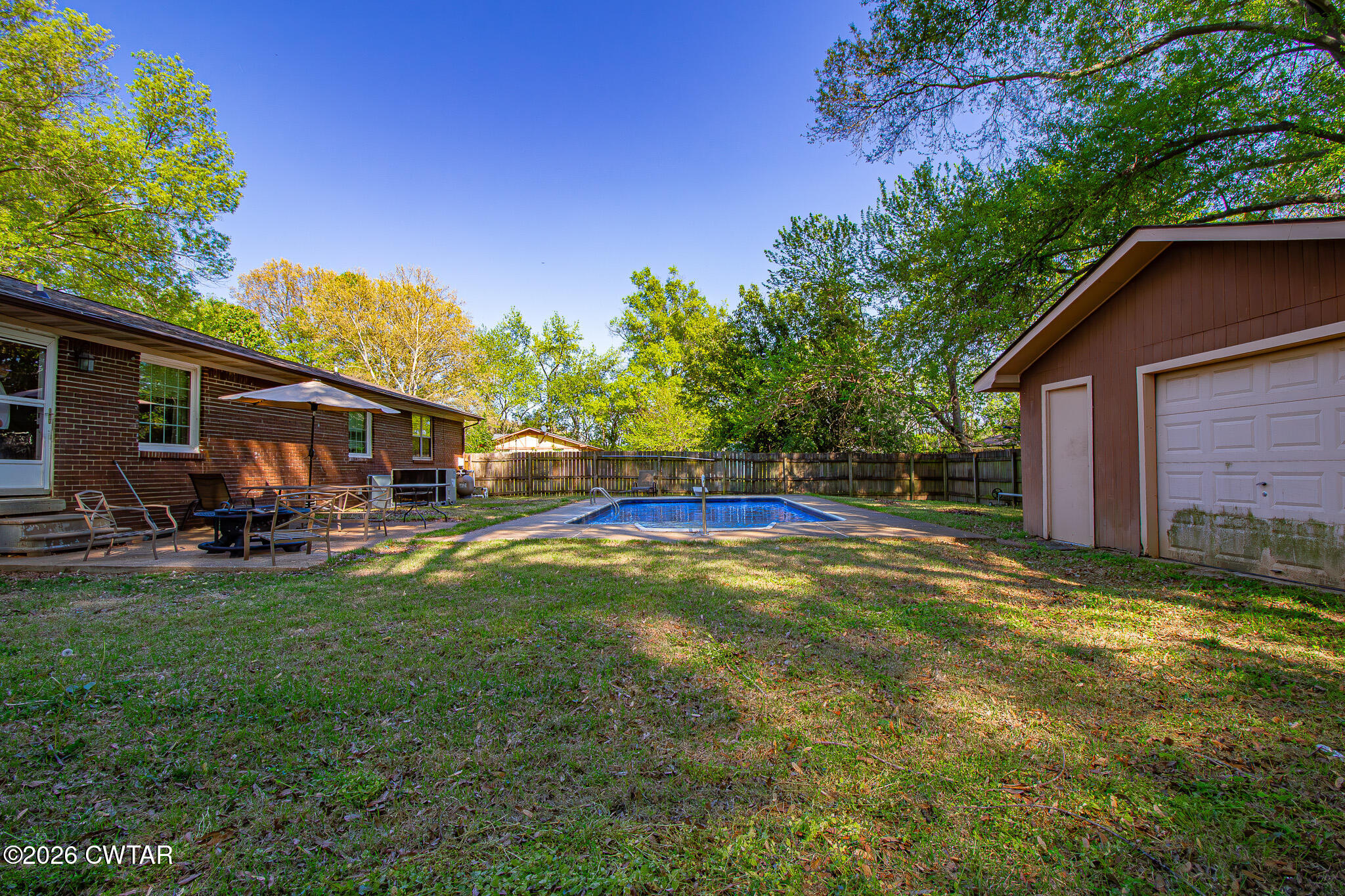 3075 Arnold Street Milan, TN 38358 - Photo 24 of 24 a view of a house with backyard and sitting area