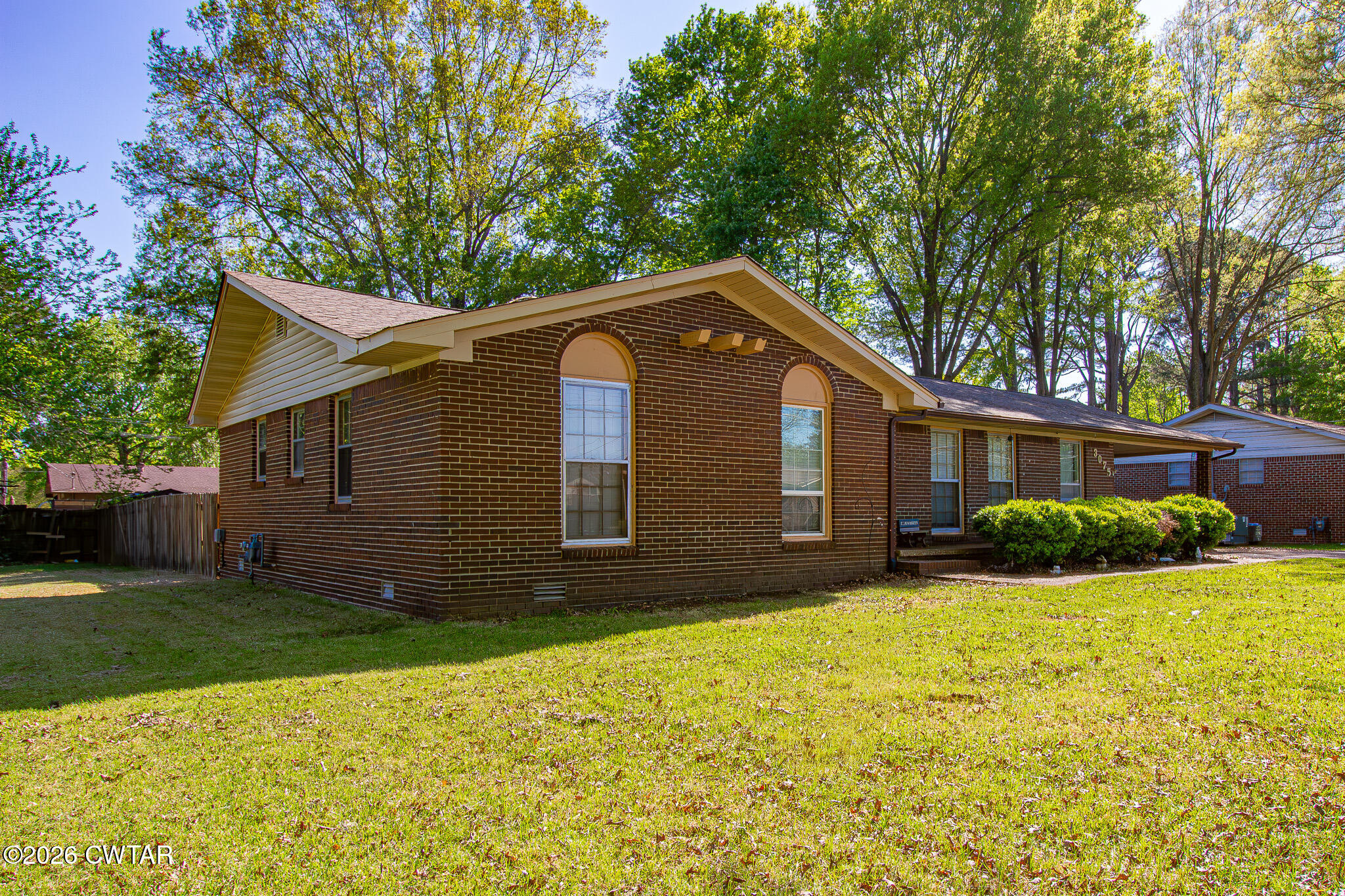 3075 Arnold Street Milan, TN 38358 - Photo 4 of 24 a front view of house with yard and green space